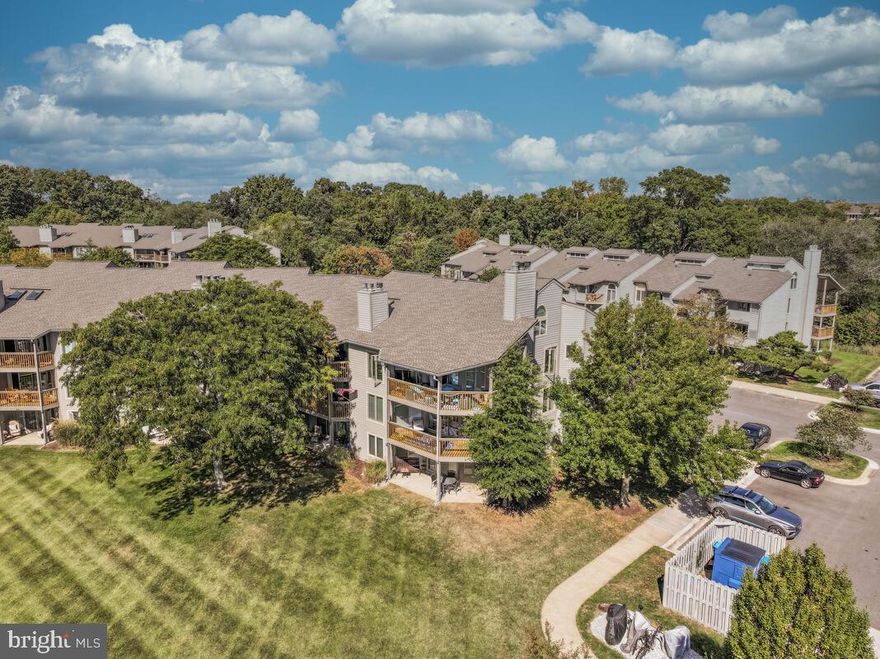 Welcome to Chesapeake Harbour! This beautifully updated Marina VIEW 2-bedroom, 2-bath condo offers the perfect mix of comfort, style, and easy living in one of Annapolis’s most sought-after waterfront communities is just waiting for YOU!
A motivated seller and located in one of the best buildings, at least that's the seller's opinion with a great view of the marina...and not a ton of other units! 
Inside, you’ll find a fresh and modern vibe with a little fresh paint accented with ceiling fans throughout, new bamboo flooring, and a delightfully unique wooden fireplace mantel adding a cozy, custom touch to the living space. The open layout flows effortlessly from the living room to the dining area and kitchen, making it great for entertaining or just relaxing at home.
The kitchen has been upgraded with a new countertop, sink and faucet, and new dishwasher, new refrigerator,  plus stainless-steel appliances including a self-cleaning oven and built-in microwave. There are even a new washer and dryer tucked away for convenience. Both bathrooms have been refreshed with stylish upgrades, giving the whole place a clean, contemporary feel.
The primary suite is a peaceful retreat with its own en-suite bath and plenty of closet space. The second bedroom and bath are perfect for guests, a home office, or whatever suits your lifestyle.
Step out onto your private balcony to enjoy views of the marina and Chesapeake Bay—ideal for morning coffee or evening wine. And when you're ready to get out and about, the community has it all: a private beach, two pools, tennis courts, jogging paths, and 24/7 gated security. Need an EV charge for your car.  It's here.  Take a stroll along walking path along the marina and enjoy a meal at the on-site restaurant. There’s even water access for boating enthusiasts!
With off-street parking and services like lawn care and exterior maintenance included, this home makes it easy to enjoy the good life without the hassle.
Whether you're looking for a weekend getaway or a full-time residence, this Chesapeake Harbour gem feels like a vacation every day.