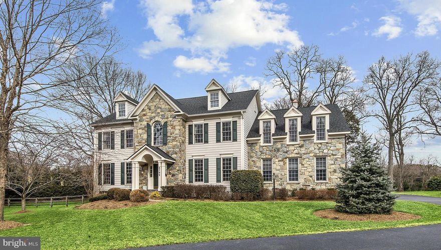 Pristine Colonial built by Buchanan-Price & sited on incredible .88-acre flat lot at top of cul-de-sac. Lots of privacy, fully fenced & room for pool! Complete w/ quality craftsmanship & detailing, 3-car garage, 2 story foyer & great room w/ floor-ceiling stone FP, formal dining & living rooms, library, gourmet KIT, lower level recreation room w/ FP, bedroom & full BA.