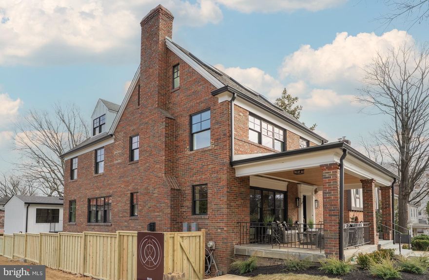 Set within the Observatory Circle neighborhood, this fully reimagined residence delivers the feel of new construction with the scale, flexibility, and craftsmanship of a bespoke renovation completed in 2025. Thoughtfully redesigned across four finished levels, the home offers five bedrooms, five-and-a-half baths, exceptional versatility for modern living, and the rare benefit of a fully separate one-bedroom accessory dwelling unit above a three-car garage.

A dramatic entry foyer with white oak herringbone flooring introduces a calm, refined interior that immediately creates a sense of separation from the surrounding city. Expansive living and dining spaces feature nine-foot ceilings, a quartz-clad fireplace, custom built-ins, a wet bar, and a striking 30-foot window wall that fills the home with natural light while reinforcing privacy.

The chef’s kitchen is both architectural and highly functional, anchored by a six-burner BlueStar professional gas range and complemented by professional-grade appliances, two-tone custom cabinetry, Cristallo quartzite countertops, a bespoke hood, and statement lighting—equally suited to daily living and entertaining. A discreet powder room completes the main level.

The primary suite serves as a private retreat, offering a generous bedroom, dual walk-in closets, and a spa-inspired bath finished in Terrazzo Italy Sacra Bianco and Calacatta Fioressa quartz. An additional ensuite bedroom and a full laundry room complete the second level, while the third floor hosts two more ensuite bedrooms designed for privacy and comfort.

The terrace level enhances the home’s flexibility with a media and lounge space, a Cambria Woodcroft wet bar, guest suite, mudroom, secondary laundry, and a concealed wine cellar integrated behind custom millwork.

Above the garage, a fully independent accessory dwelling unit provides a complete one-bedroom suite with its own kitchen, bath, HVAC system, and private entrance—ideal for guests, extended family, an au pair, or long-term use.

Outdoor spaces are unusually generous for the location, including a partially screened flagstone terrace, connecting deck, side yard, and direct access to the three-car garage—creating a layered indoor-outdoor lifestyle rarely found this close to the city.

Perfectly positioned near Georgetown, downtown Washington, and an exceptional collection of shops, restaurants, parks, and everyday conveniences, the home offers a rare balance of privacy, walkability, and connectivity—delivering a refined urban lifestyle within an established, mature neighborhood.