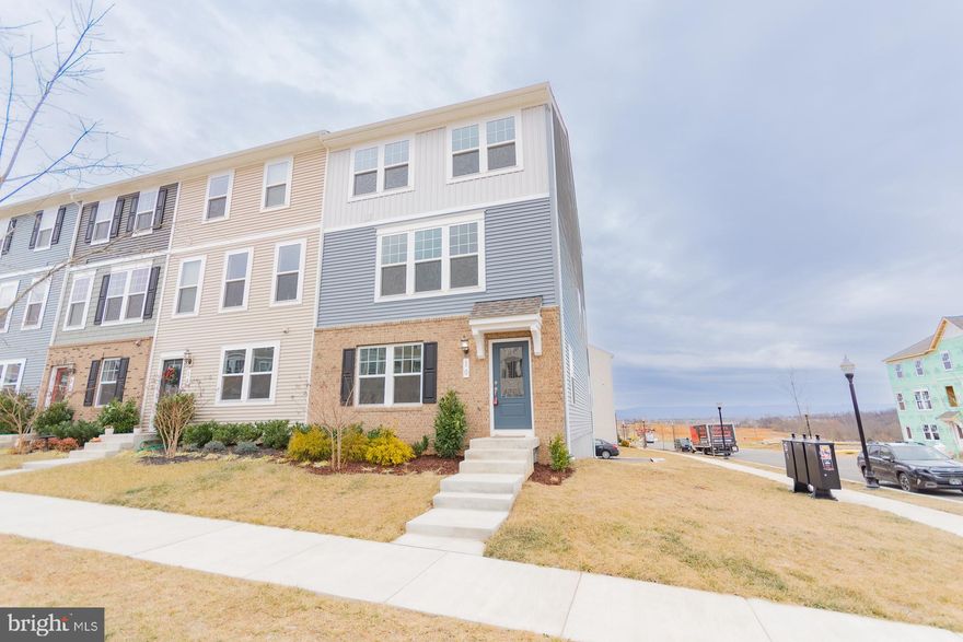 Check out this move-in ready 3-bedroom, 2.5-bath end-unit townhome in the highly sought-after President’s Pointe community.  Available now!  This home offers an open and spacious floor plan with gorgeous luxury vinyl flooring throughout the main level. The kitchen shines with stainless steel appliances, a center island, and recessed lighting.  The dining area flows perfectly into the large, bright living room, creating a welcoming space to relax or host friends.  Upstairs, the primary suite features a walk-in closet and a beautiful walk-in shower. Two additional bedrooms and a shared full bath complete the upper level. The lower level is incredibly versatile.  Ideal for a recreation room, home office, or family room.  Additional highlights include a 2-car garage, level yard with side yard, and a prime Ranson location close to shopping, dining, outdoor adventures, and major commuter routes for an easy lifestyle.  Pets considered on a case-by-case basis with application approval. 👉 Schedule your showing today!  This one won’t last long!