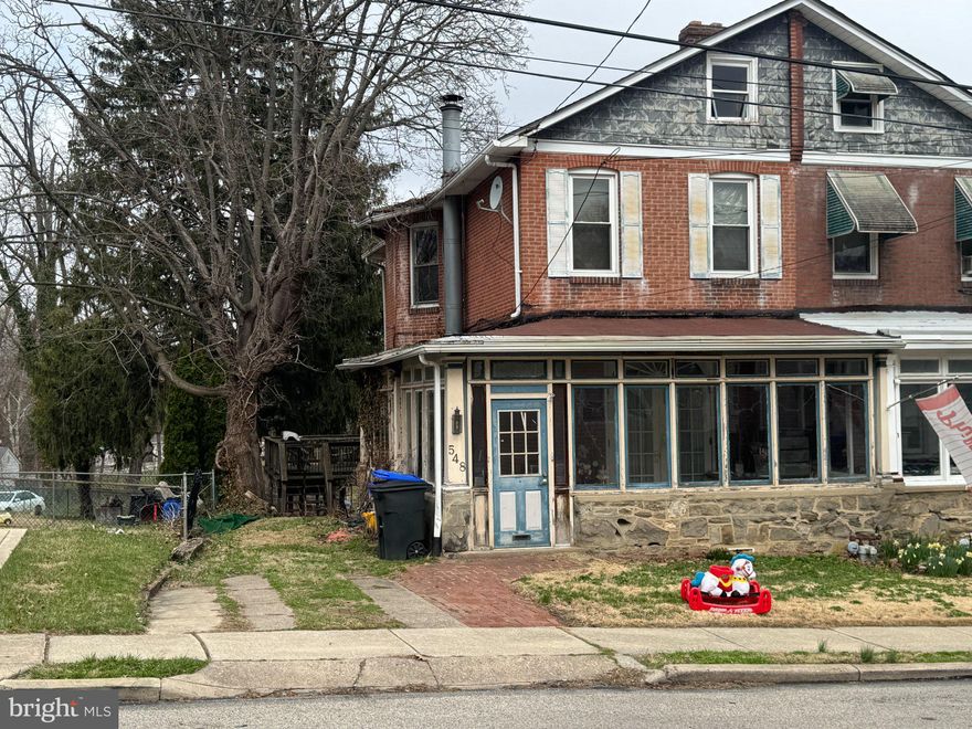 Opportunity knocks in Cheltenham! This classic brick twin is full of character and ready for its next chapter. Featuring 3 bedrooms, 1 full bath, and over 1,500 square feet of living space, this home offers solid bones and incredible potential for the right buyer. Step inside to an enclosed, wrap-around front porch with double doors to the heated vestibule, perfect for additional living or flex space. Enter the spacious living area with original hardwood flooring and a separate dining space. The kitchen offers a functional layout with plenty of cabinet space, ready for your personal updates and design vision. The side door leads to the large wrap-around deck with stairs to the backyard. Upstairs, you’ll find comfortable bedrooms and a full bath with a clawfoot tub, while the walk-up attic provides excellent storage. The basement includes laundry, utilities, and additional space for storage or workshop use. The back room is not heated but has access to the backyard through the sliders. Outside, enjoy a private backyard and rear deck, ideal for entertaining or relaxing. Important notes: The price reflects the condition. Property is being sold as-is and will require updates and repairs, including a roof replacement and cosmetic improvements throughout. This home is ideal for investors, renovators, or buyers looking to build equity and customize a home to their taste. Conveniently located near shopping, dining, and major roadways, minutes from Tookany Creek and Veterans Park. This is a fantastic opportunity to invest in a well-established neighborhood.