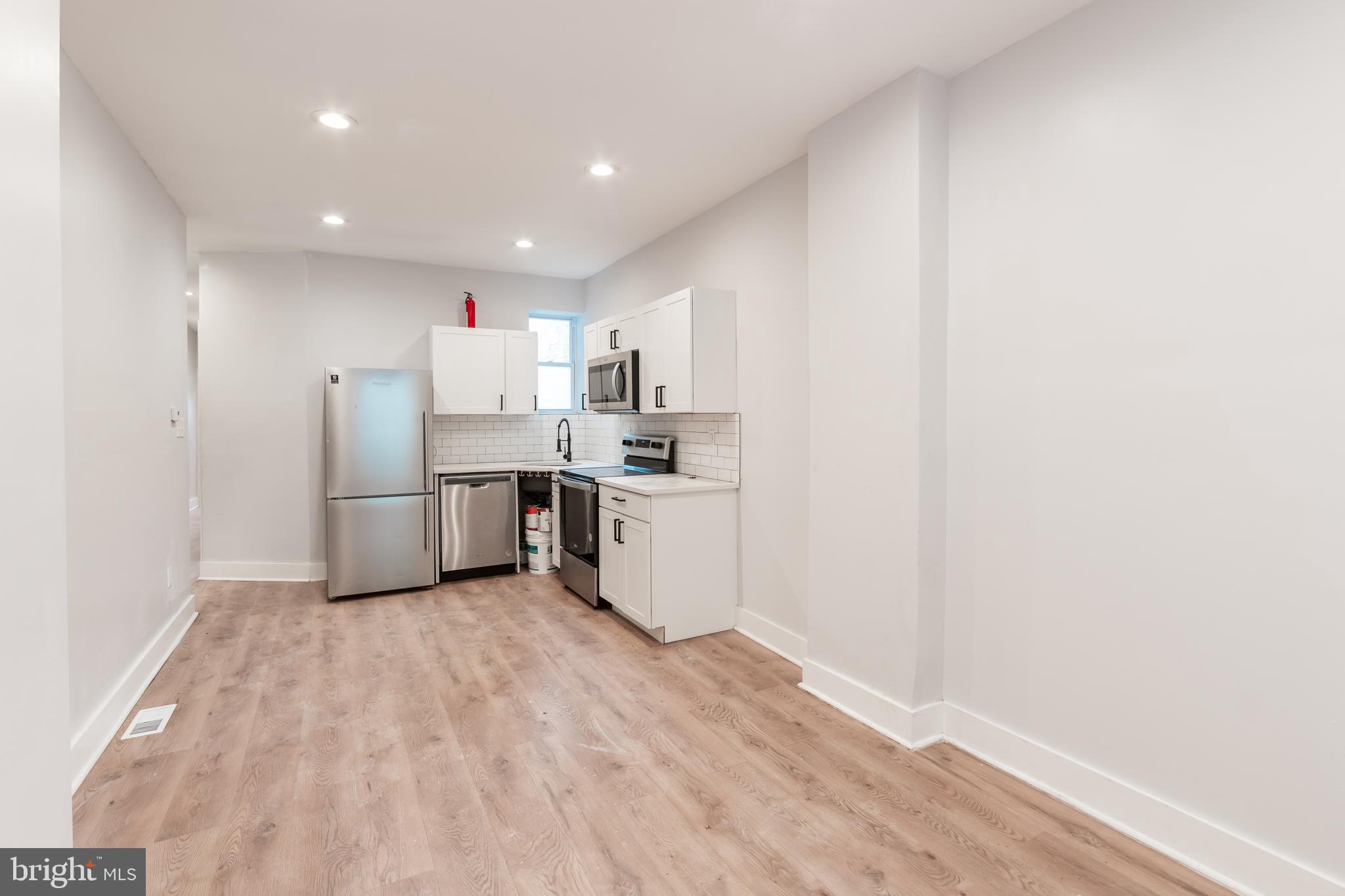 *Available Now!*
Don't miss this recently updated first floor unit with 3 beds and 2 full baths, conveniently located in West Philadelphia just a short drive from University City! The unit features a generously sized backyard with off-street parking along with a large patio area for entertaining guests. Upon entering you will be greeted with a bright and sunny open concept dining area along with an attached kitchen. The kitchen comes equipped with plenty of cabinet storage, white quartz counters, and stainless steel appliances. Just down the hall sits the first two bedrooms, both offering comfortable spaces with ample closet storage and access to the centrally located bathroom. The lower level features a large living area as well as a third spacious bedroom and second full bath. You will also find the in-unit laundry located here. Other amenities include hardwood flooring, central a/c, and recessed lighting throughout!
*Pets permitted; $500 non-refundable pet fee required.
Please call to schedule an appointment for a showing!