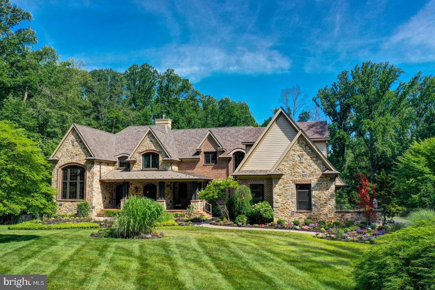 Stunning 14 year young custom built stone manor home in the coveted community of Leopard Lakes! This meticulous home offers approximately 10,000 square feet of beautifully finished living space including a resort style 1st floor Master Bedroom Suite, an exterior Paradise with glistening Armond infinity Pool & fireside screened Porch & Deck, 2nd floor Theatre & Game Room with a full service Bar, 6 Fireplaces, walk-out Lower Level w/ full Bedroom/Au Pair Suite,  and oversized 4-car attached Garage.  Dramatic 2-story Entrance Foyer with Travertine marble with views of the 2-story trussed ceiling Great Room, handsome Library/Study w/ Palladian windows, formal Dining Room w/ adjacent Butler's Pantry, Gourmet Kitchen with attached Breakfast Room open to fireside Family Room & additional in-home Office area. The 2nd Floor offers 3 additional large Bedroom Suites, incredible Media/Theatre/Game Room with plenty of cabinetry, dishwasher, ice maker, and beverage refridgerator, additional Sitting Room & Office area served by 2nd Powder Room.  This magnificent home has it all! Leopard Lakes is a one-of-a-kind community on the Main Line offering 11-acres of common grounds including a private Beach/Lake fabulous for swimming & kayaking in the summer months and ice skating & hockey in the winter, year-round tennis/pickle ball courts, playground and lakeside walking trail! Don’t miss this rare opportunity for a dream-like lifestyle that doesn’t exist anywhere else on the Main Line!