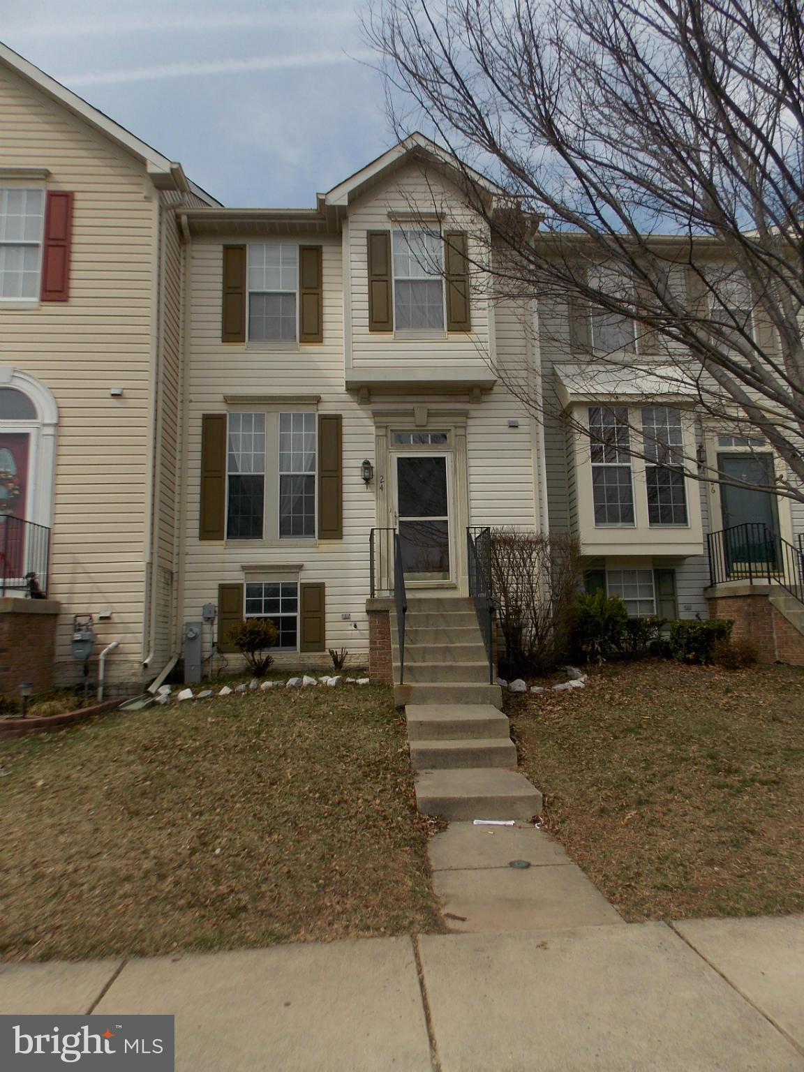 Spacious 3 bedroom townhome with large eat in kitchen & island and fenced rear yard, slider to deck. Finished basement. Freshly painted throughout, new wood floors. Ready for you to move right in. First and last month rent, pets on case by case basis, $55/adult application fee.