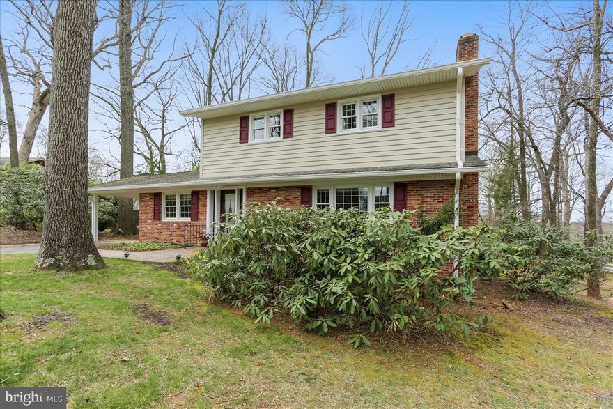 Super well cared for 4BR, 2.5BA colonial, same owners for 40 years. New kitchen, new siding and gutters, new windows, new AC & Gas furnace, new carpet in family room - rest of house hardwoods, & fresh paint throughout.  Truly a move-in-condition home! No HOA. Partially finished basement with outside walk-up stairs. Lovely screened porch on back with private wooded setting. Flexible timing.