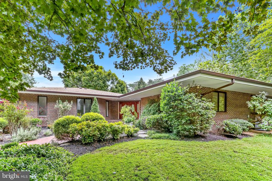 Exquisite Tuscan-Mid Century Ranch on 6 Private Acres – A Rare Luxury Rental in Vienna
Experience unparalleled luxury and privacy in this meticulously designed Tuscan-Mid Century Ranch, a true architectural masterpiece nestled on six serene acres in Vienna. Constructed entirely of brick and designed to embrace natural light, open spaces, and effortless flow, this V-shaped estate is the perfect blend of timeless sophistication and modern comfort.

Approached by a long, tree-lined driveway, this home immediately captivates with its tranquil setting and breathtaking views. The double front doors open to a grand entryway framed by glass doors, offering a stunning first impression with views of the pool and rolling pastures beyond.

An Entertainer’s Dream & A Private Retreat
Every detail of this home has been thoughtfully curated to provide the ultimate indoor-outdoor lifestyle. The sunken living room, wrapped in walls of glass, seamlessly merges with the surrounding landscape, creating a serene, light-filled space perfect for relaxation or entertaining.

The gourmet kitchen is both functional and striking, featuring cherry cabinetry, granite countertops, an oversized walk-in pantry, and a cozy breakfast nook with sliding glass doors leading to an expansive wraparound deck. Here, mature trees provide a lush, private backdrop for morning coffee or evening gatherings.

The formal dining room is spacious and elegant, ideal for hosting memorable dinner parties, while the sun-drenched family room with a fireplace adds warmth and comfort. A private library/office, also with a fireplace, provides the perfect space for work or quiet reading.

A custom wet bar and laundry room complete the main level’s thoughtful design.

Exceptional Living Spaces
On one side of the home, the luxurious primary suite is a true retreat, wrapped in windows to bring in stunning natural light. A floor-to-ceiling stacked stone fireplace creates an inviting ambiance, while large closets and a spa-inspired ensuite bathroom offer a five-star experience.

Two additional spacious bedrooms and a beautifully designed full bathroom complete this wing, ensuring comfort and privacy for family or guests.

A Lower Level Full of Possibilities
The walkout lower level is an unexpected delight, offering additional space for entertaining, wellness, and relaxation. This level features:
✔ A large family/media room for movie nights or casual lounging
✔ A wine cellar for collectors or those who love to entertain
✔ An exercise room to maintain a healthy lifestyle
✔ A private 5th bedroom with an ensuite bathroom, perfect for guests, an au pair, or an in-law suite

There is an optional 5 stall barn for use as well.

A Rare Find: Middleburg Serenity in the Heart of Vienna
This home offers the peaceful ambiance of Middleburg, yet it is just minutes from Vienna and Reston's top-rated restaurants, shopping, and major commuting routes. Whether you seek a luxurious escape, a space for elegant entertaining, or a refined retreat, this residence is truly one of a kind.

Opportunities like this are rare—schedule your private tour today!

Appointment required.  Reach out to Listing Agent for Private Tour