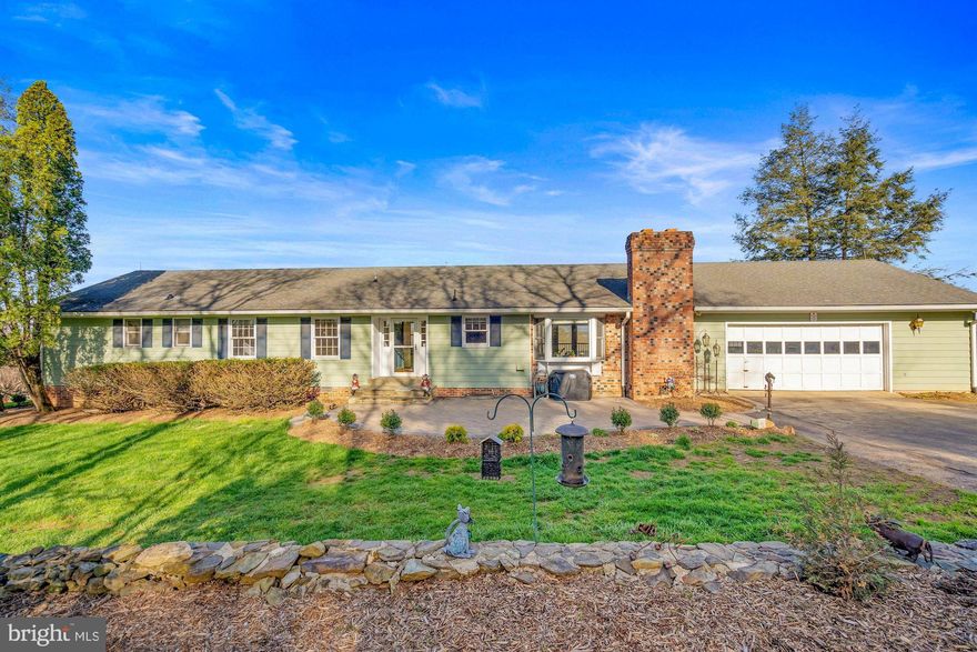 A combination of heritage, country charm, and awe comes to mind as you step foot onto this 7+ acre property. Mt. Gilead is located on the eastern slope of Catoctin Mountain, the neighborhood was established back in 1823 with the purpose of establishing a health spa from the mountain springs. That sense of calm and serenity envelops you as you take in the breathtaking views from either the back porch or lounging by the in-ground pool. You feel the tranquility of a private oasis with panoramic views of the Blue Ridge Mountains as your backdrop. This ranch/rambler boasts 3 Bedrooms, 3.5 Bathroom with 2000+ finished sq ft. You'll find historic stone walls and hardscaping throughout the property. The home has an attached, spacious 2-car garage loaded with built-in storage and a heated 1-car detached garage/workshop with a work space above. The work space currently operates as a commercial kitchen but can be used for a wide array of purposes. An insulated 1200 sq ft steel-framed barn with 3-stalls & skylight panels is a perfect setting for a workshop. Two well-fenced fields with a conjoined run-in shed are ready to welcome any animals to the property. For those who love to entertain, not only is there a meticulously maintained private pool with a waterfall, the hardscape surrounding the pool is wired for a potential outdoor kitchen and/or hottub! Most recent upgrades have been fresh paint throughout the home (2022), brand new pressure tank (2022), new generator battery (2021), new pool pump (2019), and a newer HVAC system just to name a few. Downtown Leesburg, Purcellville, a sundry of wineries, local shops & restaurants are all within 15 minutes.