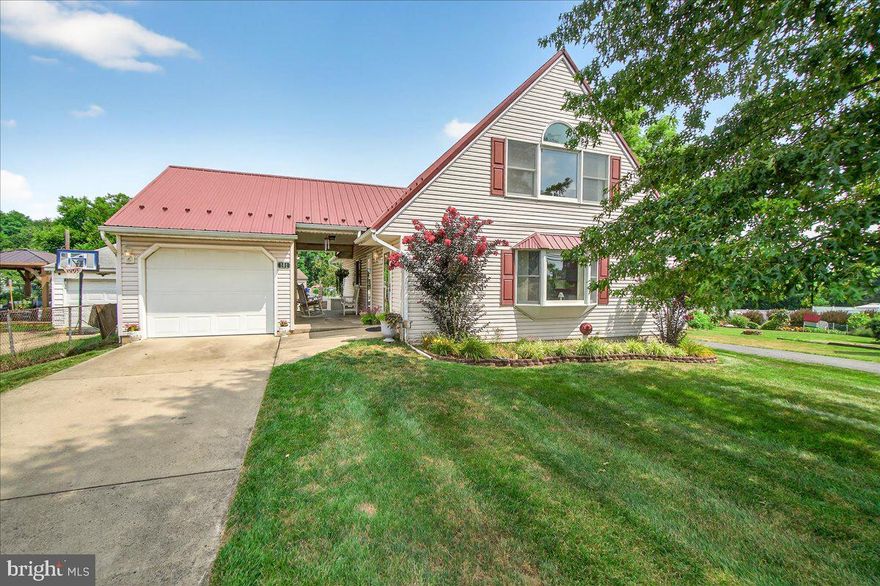From the meticulously manicured lawn to the mature gardens alive with seasonal blooms, this pristine Cape Cod gem offers its first opportunity on the market in many years. A complementary standing‑seam metal roof crowns the home, combining durability with refined curb appeal.

Nestled on an in‑town parcel, this character‑filled residence backs to a lush, tranquil setting. The expansive lot includes a detached shed and garage, linked by a breezeway, plus a concrete patio with steps descending gracefully into the backyard—an ideal layout for indoor‑outdoor living and entertaining.

Step inside to a spacious country-style oak kitchen, featuring a peninsula that flows into the dining and living areas with open sightlines—making it the perfect canvas for gatherings. The stone gas fireplace becomes a natural focal point for cozy evenings and entertaining alike

Main Level:Two comfortable bedrooms Full bathroom with laundry hookup Partially finished basement offers additional living space—or storage flexibility Upper Level:A generous primary suite with full bath
A versatile second bedroom—ideal as a nursery, home office, den, or workout space All thoughtfully arranged to suit modern needs or future adaptations.

“Country charm meets town convenience: spacious kitchen, stone gas fireplace, detached garage, and a lush outdoor sanctuary in Thurmont."