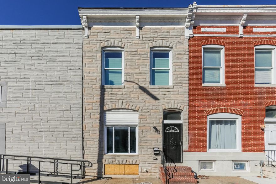 Welcome to this charming, move-in ready Federal-style row home in the heart of Baltimore! This property would make the perfect addition to any investment portfolio or as a first home utilizing one of the many down payment assistance programs the area offers. Boasting 2 large bedrooms, 2 full bathrooms, and nearly 2200 sq. ft. of total living space. The spacious living room features high ceilings, recessed lighting, and fresh neutral paint. The updated kitchen showcases white cabinetry, subway tile backsplash, and gas cooking with direct access to the fenced-in backyard. Upstairs, you’ll find two bedrooms with large closets providing ample storage and a full bath with soaking tub. The finished basement offers flexible living space, a den/flex room, and full bath. Conveniently located just a few blocks from Patterson Park, with easy access to Johns Hopkins, Little Italy, and the Inner Harbor, this home has the perfect location—schedule your showing today!