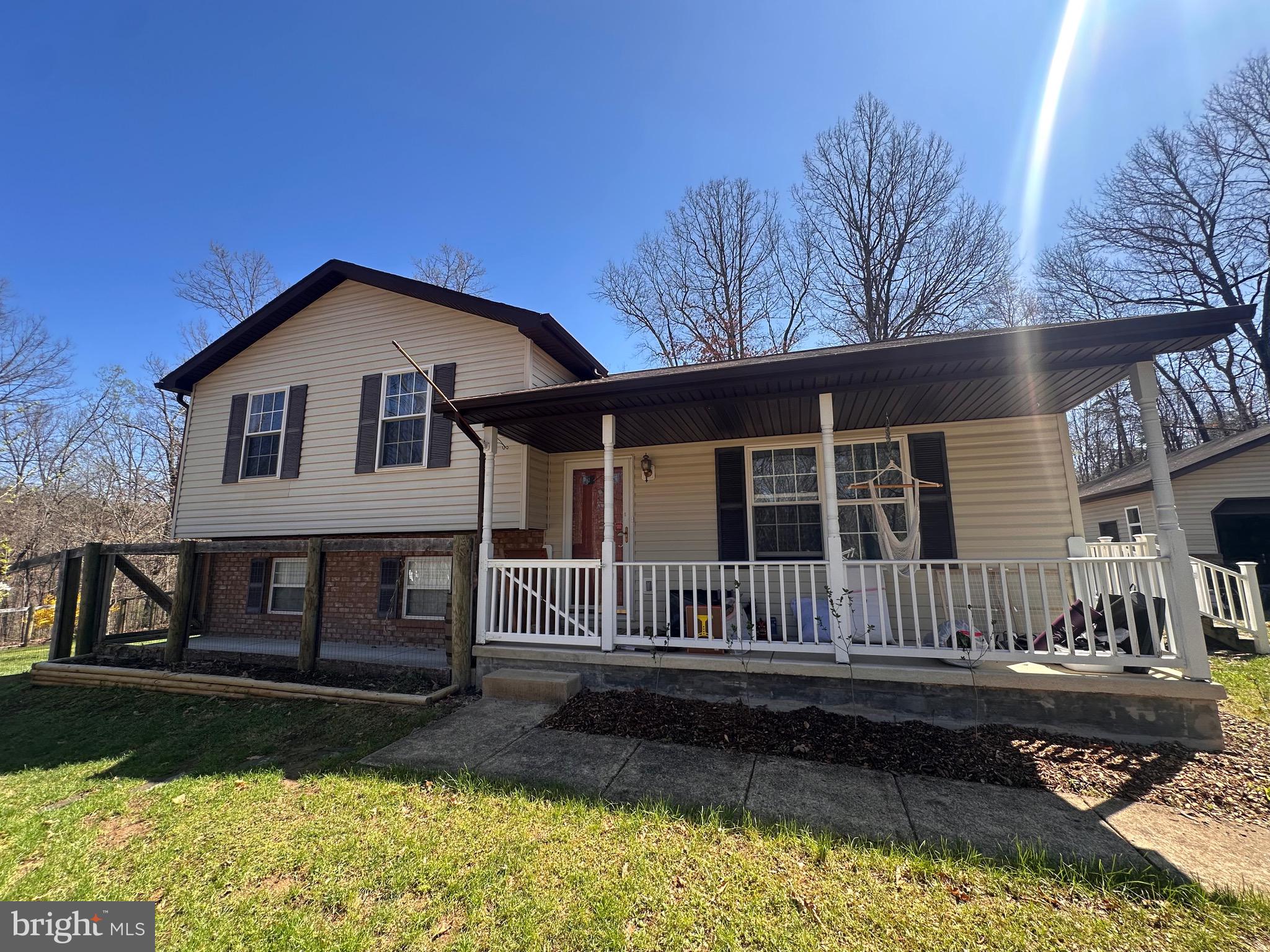 This charming, private and wooded property offers a perfect blend of comfort and country living - all with plenty of space from the neighbors located at the end of the cul-de-sac! Enjoy this 6.29 Acre Wooded lot with convenience of a 2-car garage with attic storage, plus two sheds and a chicken coop with an attached run—ideal for hobby farming or extra storage. Cool off in the 24’ above-ground pool, installed in late 2022, or relax to the sounds of an all-season stream that borders the property (possibly known as North Run, based on historical documents).
Outdoor enthusiasts, on top of enjoying the 6 .29 acres of tranquil space the property offers, will love the two mature pear trees, plus young apple and cherry trees, grapevines, and an abundance of blackberries and blueberries. Inside, the home is equipped with a new heat pump (2021) featuring an air cleaner and humidifier with a 10-year parts warranty, along with an updated hot water heater and pump tank (both 2019). Peace of mind comes with both passive and active radon mitigation, with the active system installed in 2023.