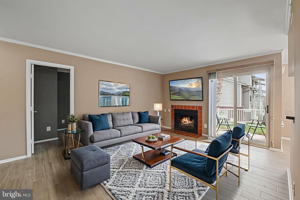 Photo of 1723 Ascot Way #A, RESTON, VA 20190 (MLS # VAFX2288678)