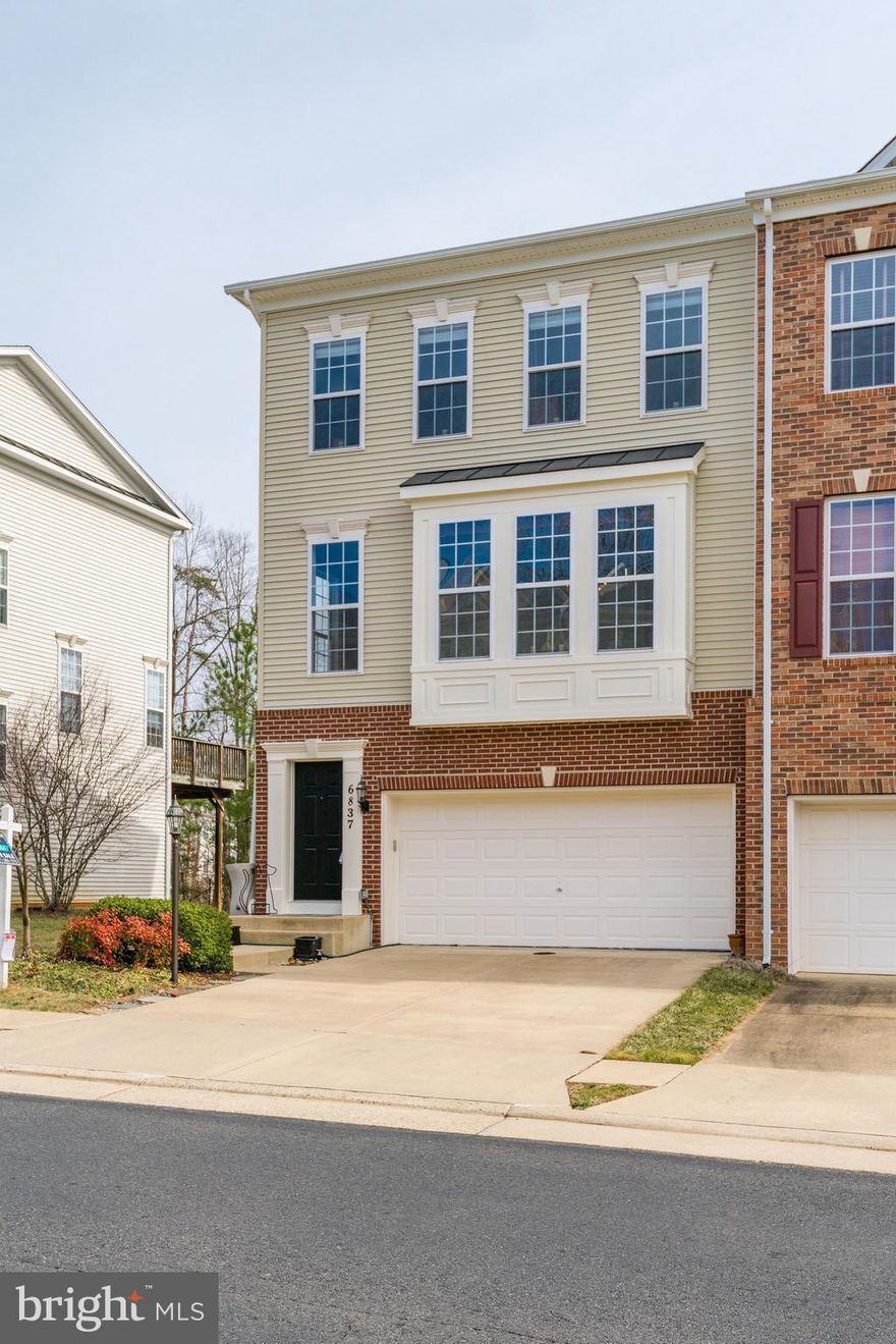 Here's your chance to own a lovely end unit townhome in Villages of Piedmont. Backs up to trees and the trail is right behind the house. Great large deck in the back plus fenced in backyard. Newly painted. Kitchen w. dinner area right by the deck and open to the family room with all new appliances. Same level has a formal dinner room, library or living room, Your choice. Upper level has oversized master w. large walk in closet and bathroom w. sep. shower, tub and his and her vanity. Two good sized additional bedrooms plus another full bathroom. You're in luck, this home has a upper level laundry room for your convenience with new washer and dryer .Basement can be used as family room, recreation room, "man/woman cave or hang out for the teens. Fully finished with newly installed floor plus powder room, access to your backyard. This community has plenty of green spaces, catch and release pond, activities and was awarded the Prince William County" Green Community" award & the "Innovative Land Planning award" in 2014/15