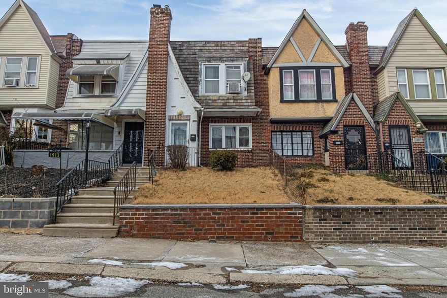 Welcome to 1911 Elston Street, a charming and well-maintained home nestled on a quiet block in the highly desirable West Oak Lane neighborhood of Philadelphia’s 19138 zip code. This inviting property offers the perfect blend of city convenience and neighborhood comfort, making it an ideal choice for first-time buyers or those ready to own for less than the cost of renting.

Step inside to discover a thoughtful 2 bedroom - 1 bathroom layout with abundant natural light and classic character throughout. The spacious living area flows easily into the dining room setting. The functional kitchen featuring warm wood cabinetry, bold red countertops, and coordinating backsplash for a distinctive look. Equipped with stainless steel appliances, including a range hood and microwave, plus a deep sink with modern faucet. Ample cabinet and counter space provide excellent storage and prep areas. Window above the sink allows for natural light, creating a bright and efficient cooking space ideal for everyday living. The basement presents excellent potential as additional living space, entertainment area, or storage—a flexible asset that enhances everyday living. The home has been lovingly cared for and is ready for your personal touches.

An additional standout feature of this home is the garage in the rear, providing secure off-street parking—an increasingly rare find in the city and a big bonus for convenience and resale value.

Located in vibrant West Oak Lane, this home gives you access to a community known for its residential charm, tree-lined streets, and proximity to everyday amenities. Enjoy easy access to shops, dining, transit options, and major commuter routes for a seamless city lifestyle. The 19138 area continues to attract buyers with its strong sense of community and solid value in Philadelphia’s real estate market.

Affordable mortgage options and assistance programs may make owning this solidly kept home more attainable than you think—own your own piece of Philadelphia today!