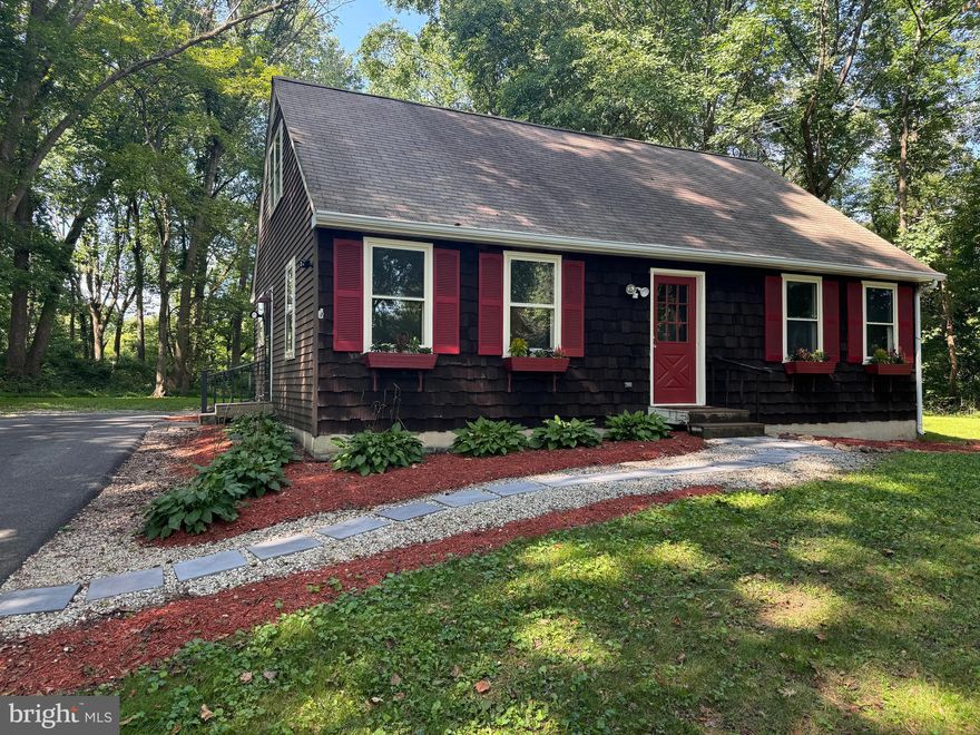 This Charming cape cod nestled on over an acre is ready for its new owners to call it home.  It sits well off the road and you'll see there is plenty of parking as you come up the drive.  The nice sized rear and side yards are level  and surrounded by mature trees, making them  great for yard games and entertaining family and friends.  The inside has been painted throughout and vinyl plank flooring has been installed in the whole house, except for the bathrooms, making it ready to move right in.  You can enter from the front door into the large living room or from the side door directly into the kitchen from the driveway.  The kitchen is open to the living room and it has  a hallway to the two first floor bedrooms, and the first floor full bathroom.  From the living room you can take the stairs to the two second floor bedrooms and the second floor full bathroom.  The full basement is wide open and could be finished by the new owners to add additional living space if wanted. This property is available for quick possession so don't hesitate to schedule your showing!