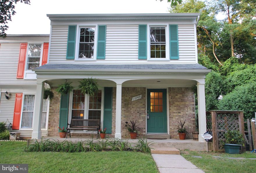 This beautiful end-unit TH boasts a charming kitchen w/ breakfast bar, SS appliances; sun-filled interior; new flooring & carpet, & baseboards; fresh paint; open living/dining room space; family room w/ access to an expansive deck w/ woodside views; spacious MBR; finished w/o basement that leads to a covered patio & fenced-in backyard. Access to major rts.