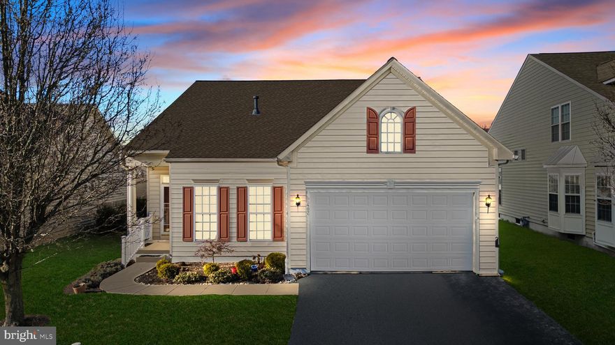 Welcome to 407 Caledonia Way in Townsend Delaware, located in a well-established, low-maintenance community loaded with amenities. The desirable Cardiff model features gleaming hardwood flooring, large bedrooms, a beautiful sunroom, and two-car garage. The kitchen is a standout, showcasing a vaulted ceiling, an ample amount of 42" cabinetry, beautiful tile backsplash, plenty of counter-space, a pantry, and seamlessly connecting to the sunroom, filling the space with natural light. At the front of the home, a welcoming living room provides a cozy setting for relaxing or watching television. The spacious family room, open to the kitchen, offers hardwood floors and a gas fireplace perfect for these cold nights. Just beyond, the bright sunroom with tile flooring opens directly to the deck, blending indoor and outdoor living. The primary suite is generously sized and designed as a private retreat, featuring a tray ceiling, a large walk-in closet, and a well-appointed en suite bath with a double-sink vanity, water closet, and a tub/shower. A second bedroom on the main level offers ample space for guests or additional living needs. The conveniently located main-floor laundry adds to the home’s functionality. Outside, the property sits on a pleasant lot and includes a two-car garage. Residents enjoy access to community amenities including a heated in-ground pool, tennis courts, workout room, meeting rooms, and a golf course. This community has regularly scheduled events throughout the year which is the perfect opportunity to meet your neighbors! This home offers comfort, quality, and an easy lifestyle all in one exceptional package. Bring in the New Year with a New Home!