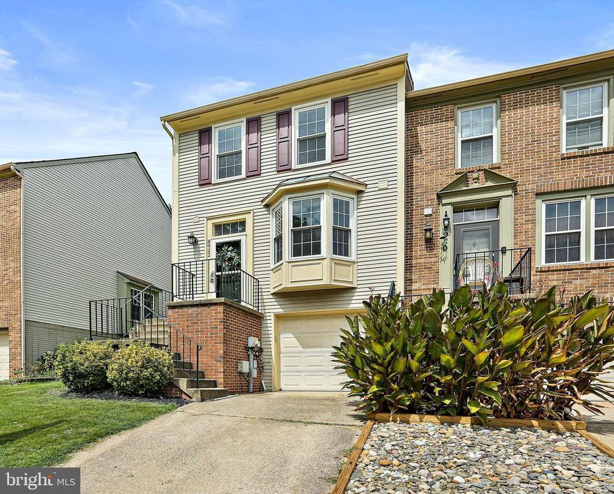 Welcome to 8922 Rosewood Way - a fantastic end unit 2 bedroom, 2.5 bath garage townhome in sought after Aspenwood!   The main level features hardwood floors throughout the spacious living room, dining room, and updated kitchen with granite countertops and classic white cabinets.   Continue upstairs to find two generous bedrooms and new full bath.  The finished basement offers an office/potential 3rd bedroom, second full bath, and cozy wood burning fireplace.  Retreat out back to enjoy a large multi-tier deck leading to a fully fenced yard.  Attached garage for additional storage and covered parking.   New HVAC and roof has been replaced.  Convenient to all major routes, Fort Meade, and NSA.  Schedule your tour today or visit our OPEN HOUSE Sunday 8/27, 2-4pm!