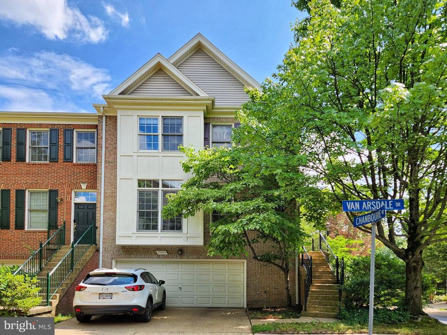 ** Gorgeous End Unit with Two Side Brick Townhouse and 2 Car Garage** Walking distance to Vienna Metro **Kitchen with Granite counter-Tops & SS  Refrigerator.  Center Island with Granite Counter-Tops** Large Breakfast Nook  ** Family Room with FP** Hardwood floors in the Living Room & Formal Dining Room ** New  Carpet on the Stairs throughout  ** Primary Room with Walk-in Closet, Vaulted Ceiling & Luxury Bath (Bathtub & Shower Booth) ** Fully Finished Walkout Basement with  Full Bathroom ** Wonderful Large deck overlooking the trees and Brick Patio with fenced backyard.  ** Light and bright.  **Newer wood floors in the basement  ** Walking to Vienna Metro Station!  ** You`ll love it !