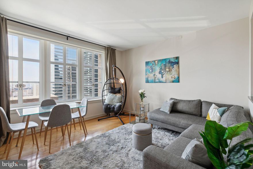 NEW PRICE! Welcome to the Penthouse floor at the Packard Grande! Luxury living in the clouds with unobstructed views of Center City, West and South Philadelphia. As you enter the unit prepare to be wowed by the abundance of natural light, pouring in from the large casement windows with sprawling views of Philadelphia’s beautiful architectural skyline. The open concept living/dining area has 9-foot ceilings and hardwood floors, the perfect layout for daily living and entertaining when the time comes! Overlooking the living area is the large, open, and updated kitchen with stainless steel appliances, subway tile backsplash, breakfast bar with sleek black granite countertops, tiled floors, blonde wood cabinets and plenty of storage. Make your way down the hall past a laundry/storage closet to the full bath and bedroom area. The large bedroom highlights amazing views, hardwood floors and large walk-in closet. The full bathroom offers a tub shower, tiled floor, marble storage vanity and chrome finishes. Don’t forget to visit the amazing amenities the Packard Grande has to offer. 24-hour front desk concierge, safe and secure building security features, state of the art fitness center, club floor with meeting/party rooms and two roof decks with 180-degree views of Center City Philadelphia and beyond! Located a block away from City Hall, shopping on Chestnut and Walnut Streets, walk to the subway and public transit, the best in restaurants, theaters, entertainment, parks and so much more! Book your appointment today, this pristine condo won’t be around too long!