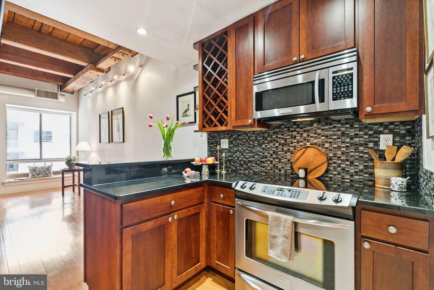 Located on sought-after Third Street in the heart of Old City, this renovated one-bedroom loft offers an ideal blend of historic character and modern living, surrounded by some of Philadelphia’s most beloved shops, cafés, and restaurants.

The spacious open living area showcases the architectural charm that defines Old City loft living, including exposed wood beams, a classic wood ceiling,oversized window, and hardwood floors. The renovated kitchen and bath are cleanly finished and thoughtfully designed, creating a move-in-ready home that feels both timeless and contemporary.

The bedroom is separated from the main living space, offering privacy while maintaining the open loft aesthetic. A well-placed closet outside the bedroom, in-unit laundry, and efficient use of space enhance everyday functionality without compromising style.

Set among cobblestone streets, historic landmarks, galleries, and neighborhood coffee shops, this home places you in the center of Old City’s rich history and vibrant energy—where centuries-old architecture meets one of Philadelphia’s most dynamic urban lifestyles.