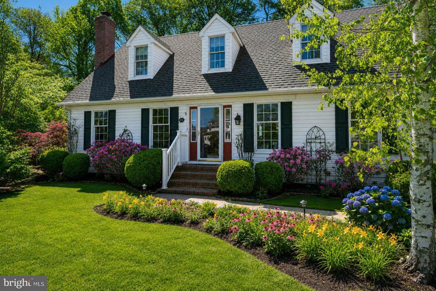 Charming yet completely reimagined, this beautifully remodeled home offers refined Eastern Shore living at its best. Set on beautifully landscaped grounds featuring lovely water views and a partially fenced rear yard with paver patio. Thoughtfully designed and updated the main level features a modern kitchen with newer appliances, cozy breakfast room, living room with fireplace, formal dining room, and fabulous sunroom. The main level owner’s bedroom has a recently remodeled en-suite bath. The second floor is currently set up as a guest apartment with private entrance. This apartment offers a private bedroom, full bathroom, kitchen, living room, dining area and dedicated laundry. In the yard you will find a Williamsburg Garden shed plus separate workshop which includes attic, HVAC, and running water. Parking for several vehicles. Encapsulated crawl space. Thoughtfully designed and move-in ready. This home could easily be converted back into a 3-4 bedroom house. Waterfront park only steps away.great for watching the boating activity and fireworks. Prime location close to downtown amenities, shopping, restaurants, and public water access.