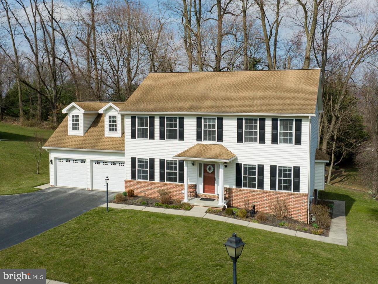 OPEN HOUSE SUNDAY MARCH 5TH FROM 12-2! Beautiful Colonial home situated at the end of a cul-de-sac that offers panoramic scenic views. Central York School District in the quaint neighborhood of Fieldstone Manor. This home has many wonderful features to include a daylight finished lower level with a ton of storage space, a bright and open main level with new vinyl plank flooring, and a luxurious master suite with large sitting area and dressing room. The main level is perfect for entertaining with an open kitchen and family room layout. The family room is highlighted by a gas fireplace and the kitchen is equipped with stainless steel Whirlpool appliances, granite countertops, breakfast area, and access to the rear deck. A formal living room and dining room are located directly off of the foyer making it a great layout for family gatherings. The upper level includes the master suite as well as three additional bedrooms and a guest bath. This is the perfect home to call your Forever Home with it being move in ready and meticulously cared for inside and out.