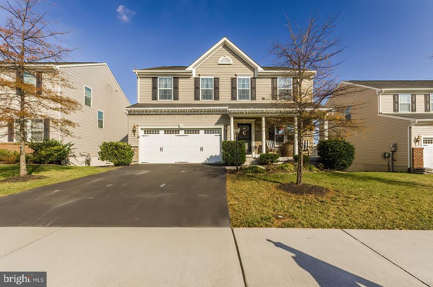 Excellently maintained and stylish open floor plan home in Snowden Bridge! The main level offers beautiful hardwood floors, kitchen, living, dining, half bath, and even a private office. Enjoy evening cookouts on the outdoor deck that has a great view of the walking path and stream.  Upstairs you'll find 4 great sized bedrooms with two full baths. The master suite has two walk-in closets. Gorgeous sliding barn door that enters the master bath. The basement is unfinished, walk out to a gorgeous patio,  plumbed for a full bath, and ready for your finishing touch! New Carpet installed throughout the entire home within the last year. Take advantage of a 2 car garage with a newly added workspace. Dog Fence around the entire home with two collars that will be left behind.  Enjoy all the community has to offer, including a community pool, sports complex with tennis & basketball courts, playground, trails, parks and more. New elementary school and daycare center coming soon. Come see this well cared for home and make it yours!