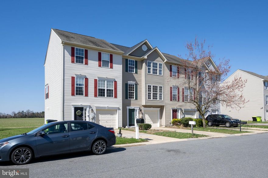 REFRESHED & MOVE-IN READY - Discover the perfect blend of comfort, flexibility, and scenic surroundings with this 3-story interior townhome in Shipbuilder’s Village, located within the charming and historic town of Milton, Delaware—just minutes from the Delaware beaches. This buyer-friendly home is designed to meet a variety of needs, offering 3 spacious bedrooms and 1 full plus 1 half bath, along with a versatile ground-level flex room that can easily serve as a 4th bedroom, home office, gym, or media room—ideal for today’s flexible lifestyles, remote work needs, or multi-generational living. One of the standout features is the peaceful setting—this home backs directly to open farmland, providing rare privacy and tranquil views you won’t often find in a townhome community. Enjoy outdoor living with a ground-level patio and a second-story deck, perfect for entertaining, relaxing, or taking in the natural surroundings. Buyers will appreciate the added value of an attached 1-car garage, no HOA or COA fees (a rare find in this area), and the ability to fence in the backyard—giving you more freedom, fewer restrictions, and long-term cost savings. Whether you’re searching for a primary residence, vacation home near the Delaware beaches, or an investment property, this Milton townhome offers location, flexibility, and lifestyle appeal—all in one. Schedule your showing today!