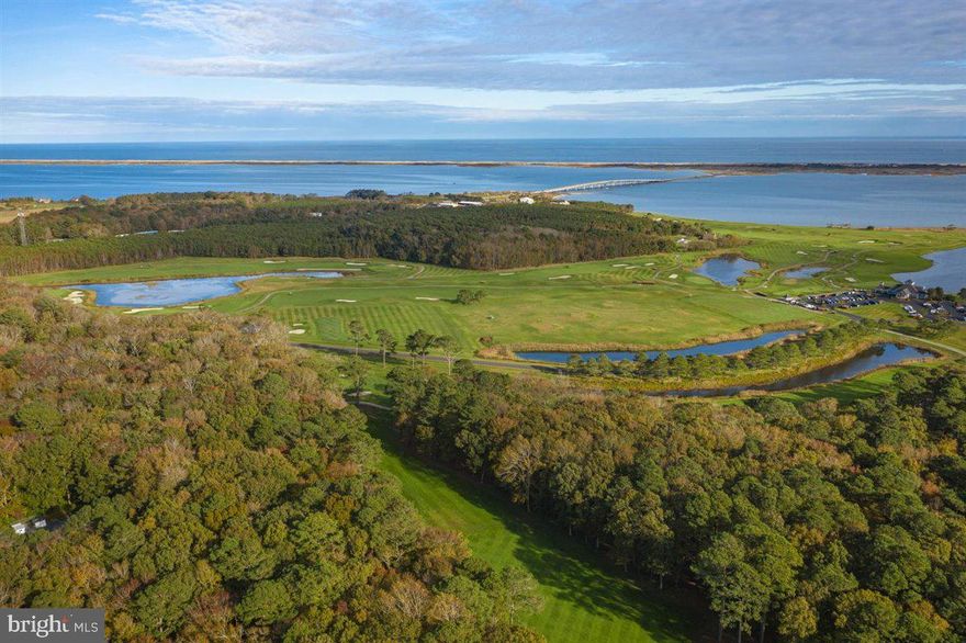 Over-sized lot in Golf Club Shores subdivision. 2.5 miles from Assateague Island National Park. 8.6 miles from downtown Ocean City.  Survey and permit plan on file. No HOA fees or City taxes. Community golf course and boat ramp on site. Convenient location to schools, beach and shopping.