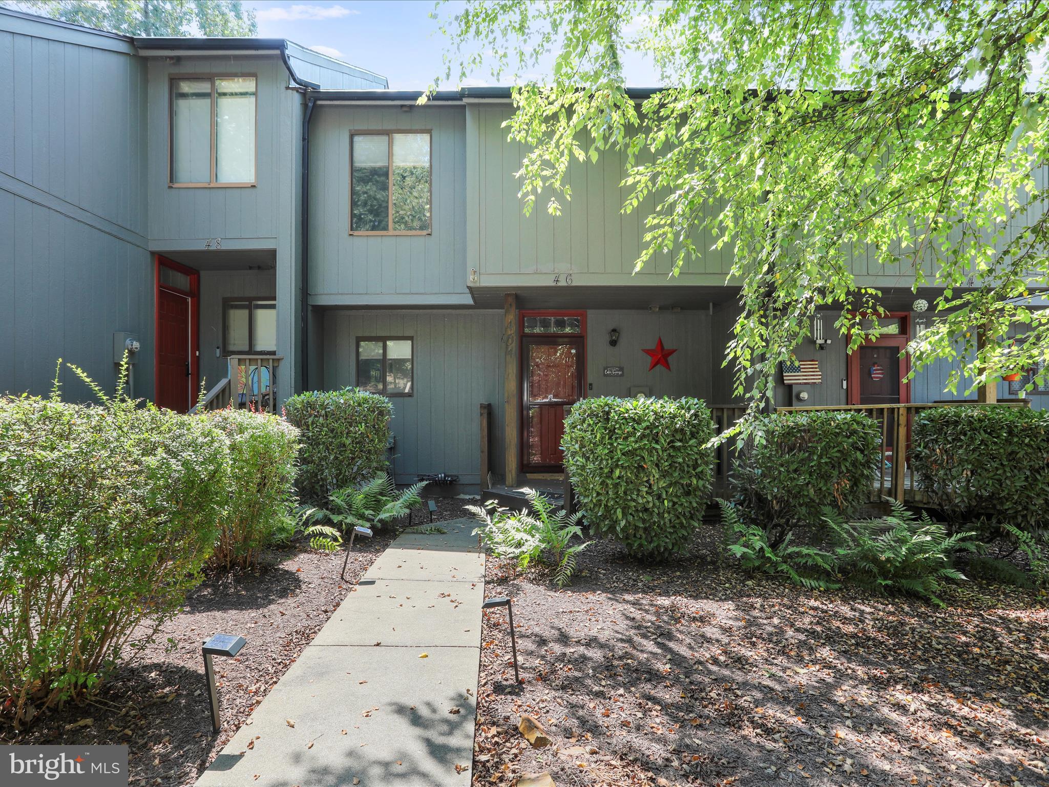 Zillow has the HOA incorrect. The HOA is $67.00 a month not $192,.00 a month. Unpack and move in: IF you have been looking for a weekend get away (or retirement home, etc) you have found your new home. Freshly painted and decorated with taste. Main level is vinyl plank flooring. Remolded kitchen, with stainless steel stove & refrigerator. Large farm sink overlooks dining area/living room with butler window for entertaining. Living room not only has a fireplace but you walk out on your balcony overlooking a peaceful & serene view of the lake and water fall. Beautiful every season of the year.
3 finished levels. Upper floor has 2 bedrooms, 2 full baths with primary bedroom having its own balcony overlooking a beautiful setting of a lake and small water fall. Primary bath has a romantic area with soaking oversized whirlpool tub. Laundry on upper level. Lower level walks out to a walking path, full bath and a large family room big enough for a pool table. Partial wall of shelves for your collection. Roof installed 2024
Exfinity is the internet service for people who work from home..