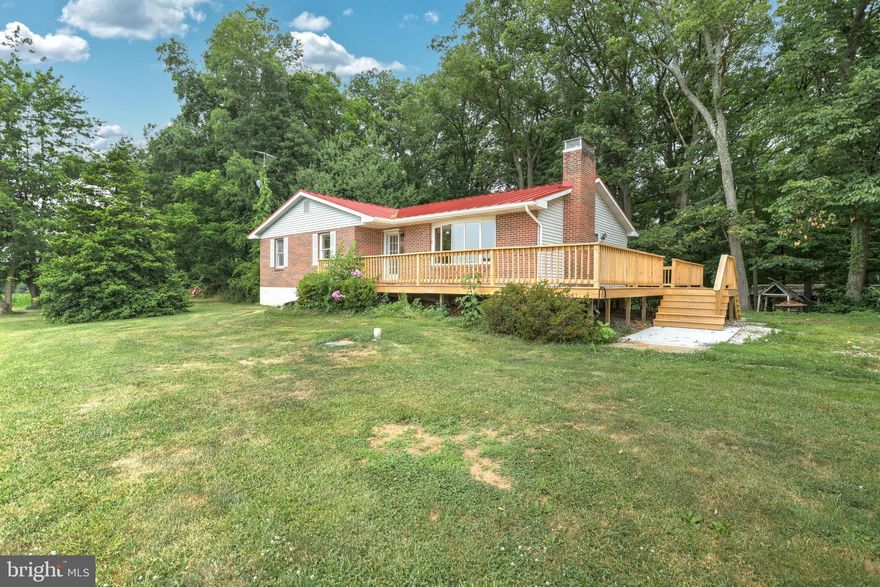 Secluded rancher with over 20 acres to include 10 tillable acres, with an additional building right. This home boasts new hardwood flooring, a new wrap around deck, and 1st floor laundry. Brand new roof and new furnace, water heater, water filtration system and radon system. Attached 4 car garage with new roof and additional 250 amp breaker. Beautiful updated home with amazing views!