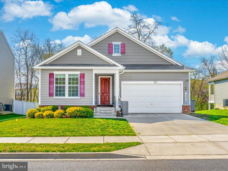 You asked ...We delivered! Adjusted price to $485k! Come see all the extra touches in this beautifully crafted, contemporary Rambler? $$ Monthly Cost and Energy Savings with seller owned solar panels! The exterior is complete with a downspout rain barrel, oversized 2 car garage in the front; 10x20 Trex deck and fully fenced yard in the back! Inside you'll find a custom built pantry, ceiling pot rack, easy access shelving in closets and barn door to primary bathroom! Built in 2019, this well maintained home has LVP floors throughout, Quartz countertops, coffee station and bonus office nook. You'll feel right at home with the perfect blend of comfort, efficiency, practicality, and convenience. Don't miss your chance on this low maintenance, better than new home with finished basement, graded-level lot, and storage shed!
Don't forget to notice the open floor plan with 9’ ceilings, creating a spacious and inviting atmosphere. The main level offers 3 comfortable bedrooms, 2 full baths, and a well-appointed open kitchen. The extra tall living room slider brings in tons of natural light and leads you to the deck. The finished basement adds double the square footage and includes an in-law suite, full bathroom, and dedicated office space! There are two additional flex spaces for your home enjoyment, i.e. gym, movie / game nights, kids playroom.
The garage provides plenty of room for storage, hobbies, and larger vehicles. Enjoy the neighborhood amenities , including outdoor swimming pool, playground, basketball court, soccer field, community clubhouse. Walking distance to shopping center with restaurants, retail, gym, coffee, groceries!
Conveniently located near major commuter routes and everyday amenities. Near medical facilities, new Meritus Medical School, colleges, Ft. Detrick and multiple distribution centers: Amazon, Lowes, Home Depot, Black & Decker, and more! Make an offer today! Perfect place to call home!
