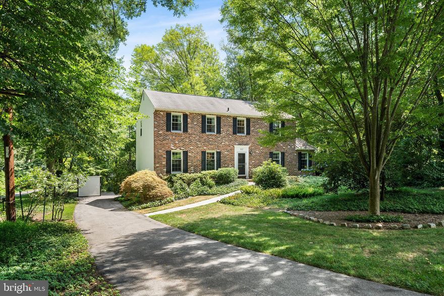 All offers due by 5pm Monday, August 25th. Lovingly maintained and updated by the same owners for over 40 years, this beautiful brick colonial sits on a picturesque, tree-lined lot in sought-after Radnor Township. From the gently sloped driveway, a new stone path winds through lush landscaping to a new front door framed in fresh woodwork and molding. Inside, the light-filled foyer opens to a gracious living room with gleaming hardwood floors. Just beyond, the formal dining room features updated lighting and a charming bay window overlooking the tranquil backyard vistas. The expansive eat-in kitchen boasts rich solid-wood cabinetry, a center island, pantry closet and glass sliders opening to the wraparound composite deck. On the opposite side of the main level, the sun-splashed family room features a new gas fireplace, hardwood floors and access to the rear porch. A dedicated laundry room and adjacent powder room complete this effortless first floor. Upstairs, the spacious primary suite includes dual closets and a serene ensuite bath with heated floors, towel warmer and glass shower with bench seating. Three additional bedrooms share a newly tiled hall bath. The finished lower level—outfitted with newer flooring and insulation—offers flexible space for relaxing, plus direct access to the two-car garage and additional storage. Out back, the sprawling deck steps down to a leafy, tree-lined greenspace with ample privacy and room to play or garden. Additional highlights include award-winning Radnor Township schools, a home generator and newer HVAC. Mere minutes from the charming towns of Wayne and Bryn Mawr with easy access to commuter routes and Newtown Square, this home is a Main Line find! Don’t delay; schedule your private showing today!