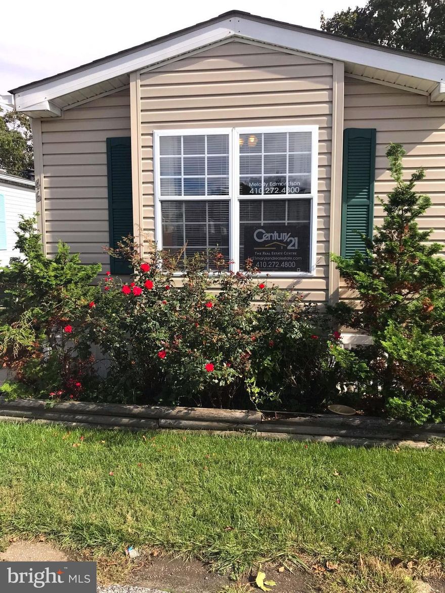 MOTIVATED SELLERS!! Just reduced!!  Well maintained spacious 2 bedroom 2 bath mobile home single wide with open floor plan. Large kitchen with breakfast bar. Laundry area off kitchen.  Purchase is subject to park application and approval,  Application fee $35 per person  Lot rent (500) to be paid monthly includes water and sewage. Close to route 40, I95 and APG.