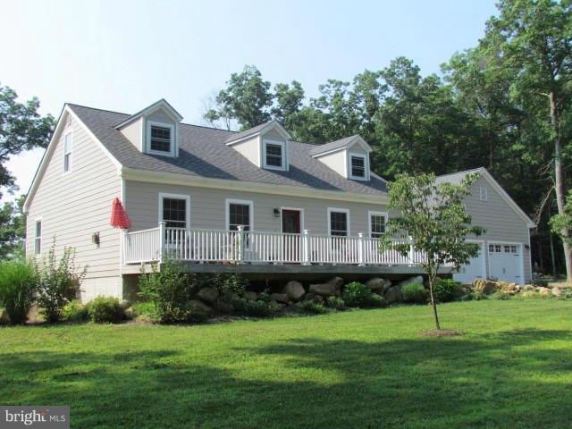 Beautiful Cape Cod On 6.6 Acres W/Private Country Setting Yet Close To Winchester & No VA-Perfect Location! This Custom Built Home Features 3 Bedrooms-Master Bedroom On The Main Level-2.5 Baths, Formal Living & Dining Rooms, Sep Laundry Room & 2.5 Car Attached Garage! Partially Finished Walk Out Basement W/ Family Room , Office , Plumbed For Full Bath and Room For A Workshop. This Is A Must See ..