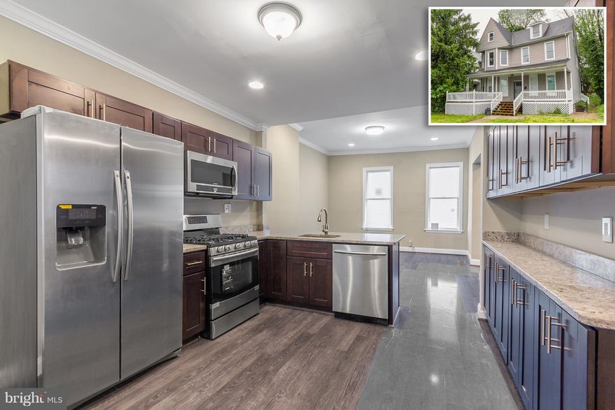 INCREDIBLE RENOVATED VICTORIAN WITH OVER 2,200 SQ. FT. OF LIVING SPACE!  Hw floors throughout the main level, spacious living room, gourmet kit w/ granite counters, ss appliances, & tons of cabinet space, main level half bath, Master suite w/ full bath, generous room sizes, full basement w/ laundry & storage space, & inviting front porch! Located steps from Gwynns Falls Park! Waterproofed basement