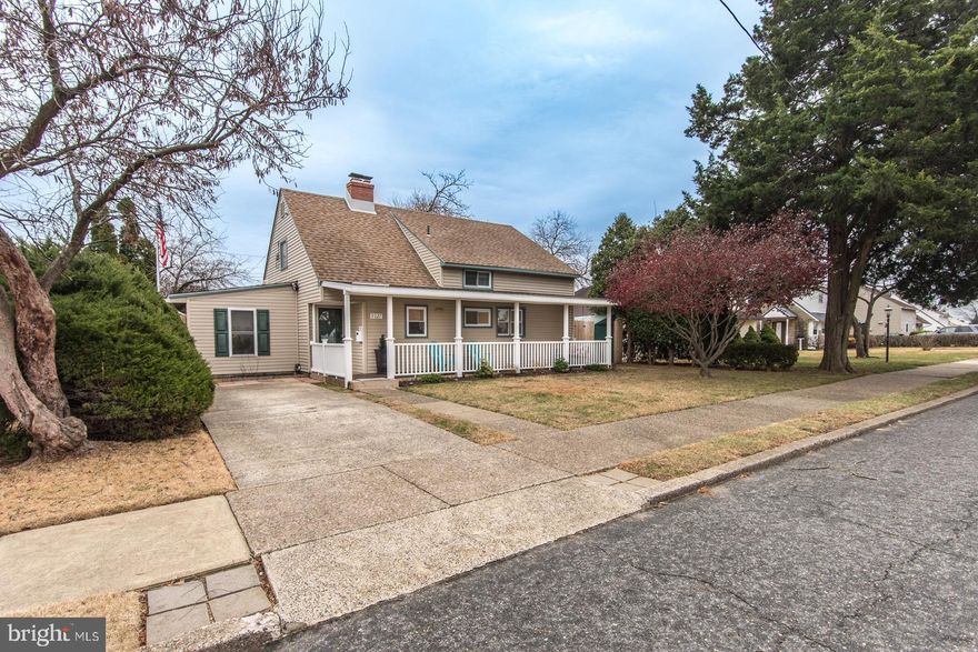 Welcome to this beautiful, move-in-ready Cape Cod-style home that blends suburban charm with city convenience. This 3-bedroom, 1-bathroom home offers a private driveway and a welcoming covered front porch surrounded by a spacious front yard.  Upon entering, you'll be immediately impressed by the home's craftsmanship and attention to detail. The first floor features a large living room with a brick, vent-free gas fireplace, perfect for cozy nights. The kitchen comes equipped with new, matching stainless steel appliances, including a dishwasher and trash compactor.  Adjacent to the kitchen is a versatile flex room, currently serving as a dining area and study, but easily adaptable to a family room, home office, or even a 4th bedroom with extra-large closet.  The full bathroom showcases a stylish white vanity with a brushed nickel goosehead faucet, ceramic tile accents, and matching fixtures.  Another bonus room at the back of the home offers additional living space, filled with natural light from numerous windows. This room also includes a custom-built laundry closet for your convenience and a sliding glass door that leads to a deck and the backyard.  Upstairs, you'll find a spacious bedroom as well as an attic/utility room with workshop area, which houses a brand-new hot water heater and offers extra storage space.  The fully fenced-in backyard is ideal for entertaining, featuring a large deck and plenty of space for outdoor activities. An elevated, fully finished She Shed, currently used as a yoga studio and gym, is equipped with electrical access and air conditioning.  There are endless possibilities with this flexible space and could also be an office or additional living area.  The home is zoned for both heating and air conditioning as the split units offer comfort and convenience with wall-mounted controls throughout.   Brand new side and back roof. 
 There are also 2 sheds with plenty of room for patio and lawn/outdoor equipment.  Located near shopping, schools, playgrounds, with easy access to highways and transportation.  This property has been meticulously cared for, reflecting true pride in homeownership that must be seen in person.  Schedule your showing today!