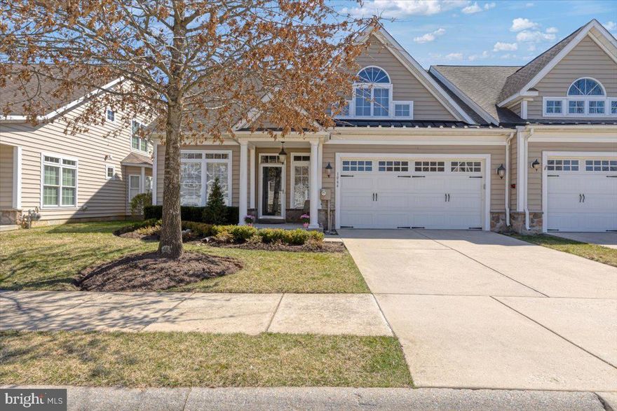 Have you been waiting to right size into an active adult community but finding everything too big, too expensive or in need of too much work? Your wait is over! 1064 Balfour Circle is just the RIGHT SIZE with 2 bedrooms and 2 full baths all on ONE level…updated and ready to move right in! A perfect blend of open-concept and traditional design, it features soaring vaulted ceilings, high end finishes, tons of natural light, extraordinary privacy, and views of nothing but trees and green space!  Entering the main living area, the great room features high ceilings, a gas fireplace, custom built-ins and two lovely seating areas.   One is perfect for entertaining, watching TV or enjoying the fire while the second is perfect for conversation or a good book and both are flooded with natural light.   The kitchen features gorgeous cherry cabinetry, stainless appliances, a double sink, and a spacious walk in PANTRY. There is also a spacious island making it the perfect place to sit with a glass of wine while preparing dinner. The adjacent breakfast area is perfect for everyday meals. During spring, summer, and fall, enjoy your morning coffee on the covered and screened in patio. Just because you are right sizing doesn’t mean you have to give up formal entertaining.  The spacious formal dining room features a coffered ceiling with deep crown molding in addition to the wainscoting and chair rail. Host your friends and family for special events or holidays. The MAIN LEVEL PRIMARY SUITE features tray ceiling, two walk-in closets and beautiful view of nature. The primary bath features a STEP-IN shower with custom tile, dual vanity and a deep linen closet.  There is a second spacious bedroom with vaulted ceiling and large closet with adjacent full bath just outside. A large storage closet and laundry room with access to the two-car garage complete this level. There is a HUGE second level loft space which can be a craft or exercise area, home office, or additional family room when the grandkids visit.  As a bonus, the second level offers a huge unfinished storage area. Outside there is a ground level deck, patio for barbecues, and lots of grass in addition to your screened in patio, which is likely to become your new happy place! Plus, the walking trail throughout the community is just past the trees. The home is a quick 5-minute walk to the pool & clubhouse which includes a fitness center, library, and activity rooms which have a full schedule of groups and clubs to join. Recent improvements include the HVAC system (2021), engineered hardwood flooring, carpet, and paint, plus a ONE YEAR HOME WARRANTY is included for peace of mind. And the HOA handles the building exterior, including the roof and windows, and landscaping.  Coldstream Crossing offers resort-style living while still being close to it all.  Kimberton Whole Foods, Downtown Phoenixville with shops, dining and activities and access to the Schuylkill River Trail are just a short drive…as are Valley Forge, Collegeville & Malvern.  Enjoy the perfect combination of right size, resort-like amenities and location in Coldstream Crossing, Chester County’s top-rated active adult community. Welcome Home!