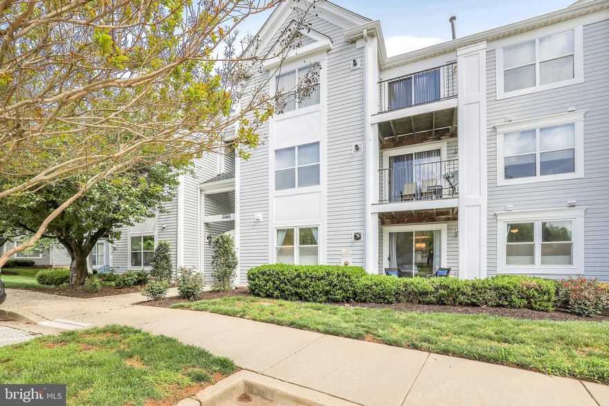 Stunning 2-bed, 2-bath ground-level condo in the desirable Decoverly Condominiums. This beautifully maintained unit welcomes you with crown molding and hardwood floors throughout the main living areas. The bright and airy kitchen boasts sleek white cabinetry, newly installed quartz countertops (2025), and an adjacent dining area. The spacious and light-filled living room features a gas fireplace, surround sound speakers, and sliding glass doors that open to a peaceful outdoor patio. The large primary suite includes a walk-in closet with custom shelving and an en-suite bath with a tub/shower combo. A second spacious bedroom suite is thoughtfully positioned across the unit for added privacy, complete with its own en-suite full bath. A separate in-unit laundry room with full-size washer and dryer (replaced 2020-2022) provides everyday convenience. Other recent updates include French door refrigerator (2023), windows (2018), HVAC (2017), garbage disposal (2025), and water heater (2014). One assigned parking space (# 13) conveys plus additional parking available for rent and ample unreserved parking spaces for guests. Residents can enjoy amenities such as an outdoor community pool, tennis courts, a dog park, and several trails nearby. Ideally located within 1-mile from Downtown Crown and RIO Lakefront offering countless restaurants, shops, Harris Teeter, AMC theaters, lakefront events, walking paths and more! Easy access to 270 and 200 makes commuting a breeze. Don't miss this!