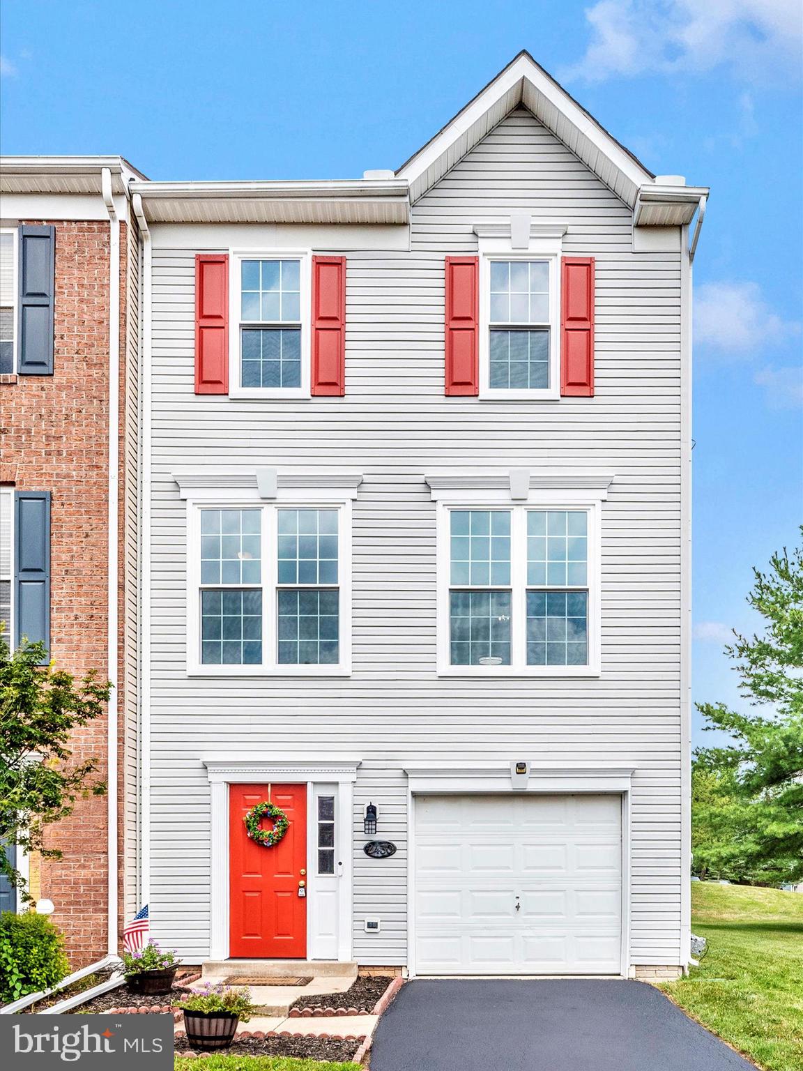Fabulous end unit, beautifully maintained and updated. You will love all the brightness this home has to offer. All NEW windows were just installed in April 2025, fresh paint, new flooring throughout, all NEW toilets, deck updated with Trex 2024, HVAC and HWH updated in 2021, Roof replaced in 2015 Covered paver patio, large yard with shed, oversized single car garage. Excellent location, just minutes to the lake, pool, tennis courts, playground, basketball courts, elementary school, professional center, restaurants, and more! Open 7/20 Sunday 12-2pm