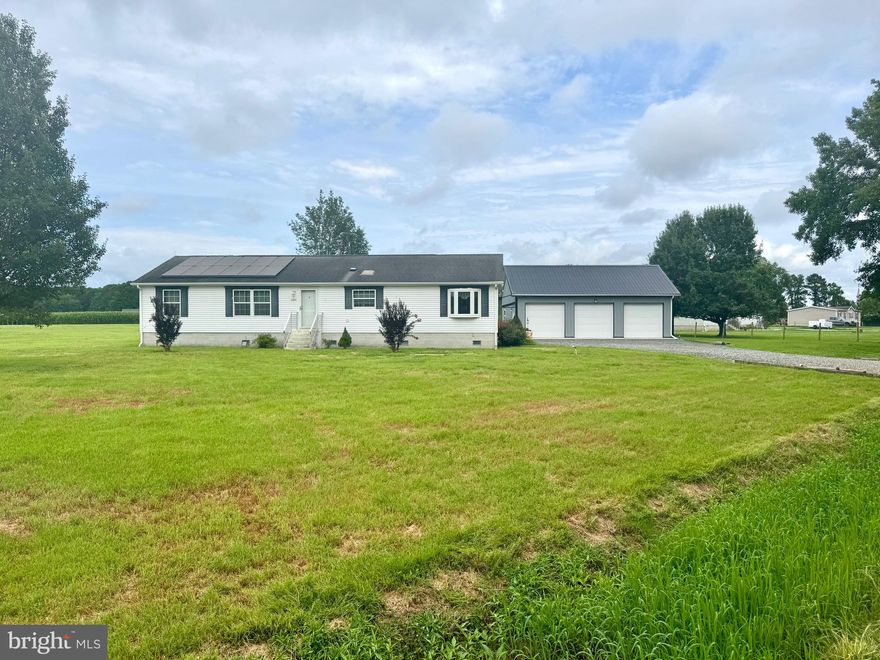 Looking for acreage and a large garage outside of town? Look no further—opportunities like this don’t come along often! This beautifully updated one-story home is nestled on 2 acres and offers the perfect blend of space, comfort, and functionality.

Featuring 3 bedrooms and 2 full bathrooms, this 1,490 sq ft home has been thoughtfully refreshed with new flooring and fully renovated bathrooms. Enjoy the peaceful surroundings from your screened-in porch, or take advantage of the two storage sheds with electricity for tools, equipment, or hobbies.

A standout feature is the oversized detached 3-car garage with a spacious loft—perfect for a workshop, studio, or extra storage. Whether you're a car enthusiast, contractor, or just need room to spread out, this setup delivers.

This move-in ready home is ideal for anyone seeking usable land and serious garage space—just minutes from Princess Anne, but with the freedom of rural living.