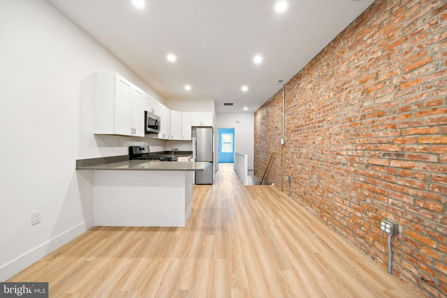 This newly renovated 2nd-floor apartment offers modern amenities and a prime location in South Philadelphia, in the West Passyunk/ Newbold section. It offers 2 bedrooms with lots of natural lighting. The kitchen is spacious and features an island for dining and entertaining. The tile bath shower also serves as a laundry area.  Throughout, you'll find exposed brick walls, central air conditioning, and recessed lighting. The apartment is situated near a vibrant culinary scene, with numerous dining options just a short walk away. Stina, Second District Brewing, Okie Dokie Donuts, & San Lucas Pizziera, just to name a few.  You are close to Sprouts,  ACME, Shop Rite, & Aldi shopping. Just 2 blocks to the Broad St Subway. Sorry no pets.