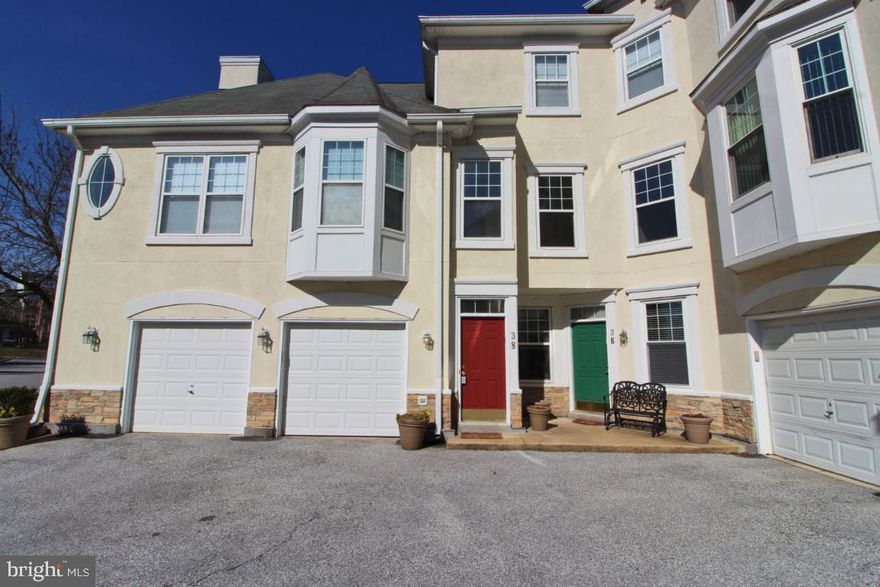 Garage condo with fresh paint, new carpet and ready to move in! The kitchen has new granite counter tops, new appliances and new cabinets.  With table space as well as a dining area and an open concept this condo allows easy entertaining.  Enjoy the peaceful view of trees on the deck right off of the large and open living area with a cathedral ceiling. The master bedroom also has a cathedral ceiling  and two large closets and a master bath.  There are two additional bedrooms and a full bath.   The community has an exercise room, pool and tennis courts for all of your outdoor needs. Easy access to major routes, restaurants and shopping make this a great location!