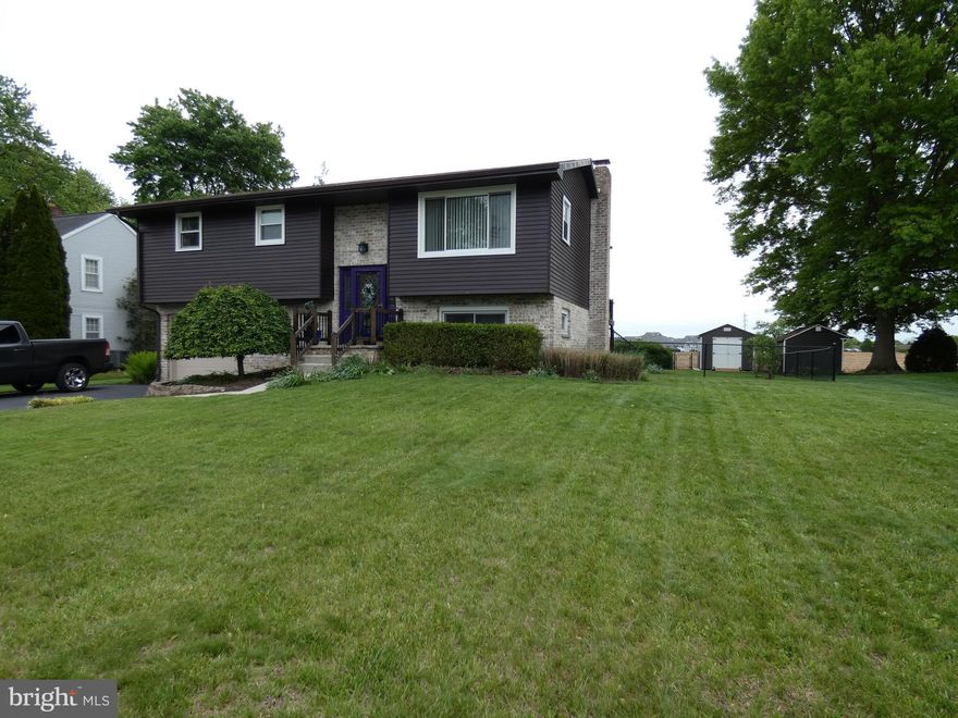 976 East Fir Street has a lot to talk about… from the heated tile bathroom floor, well maintained Manning Luxury Vinyl Plank flooring to the 4 year old roof and 4 year old central air system, upper full bath remolded 4 years ago too. Kitchen has Quartz countertops, stainless steel wall ovens and one oven steams. The large family room has a brick wall wood fireplace. Mud/laundry room has a wash sink and an exterior door leading to the back yard. Enjoy the peaceful views while sitting around gas flame firepit on the multi-level deck. The deck pergola has adjustable louvers that can close and a gutter system (keeps you dry when it rains)- and comes with screens and curtains. 10x12 Shed. Fenced back yard. Total replacement of driveway 5 years ago. Baseboard heaters, outlets and switches replaced. 3 year old gutters- downspouts- facia-soffit and exterior paint. 26x13 garage has built in cabinets and work bench, Radon system. Year-old hot water heater. Leased propane tank gas line feeds kitchen cooktop, deck grill and deck gas firepit.