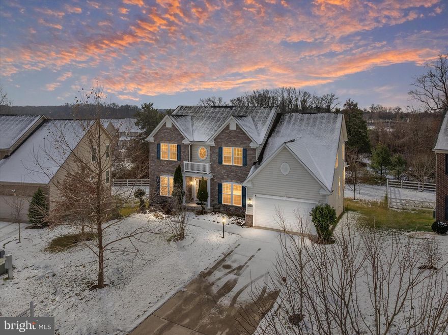 Welcome to 13605 Pynes Discovery Drive, a beautifully maintained and expansive home offering over 5000 square feet of finished living space in the highly sought-after Fairwood community of Bowie. Designed with comfort, space, and connection in mind, this home is truly ready for family life and unforgettable moments.
The main level is filled with natural light, soaring ceilings, and generously sized rooms, creating an inviting atmosphere that feels both open and comfortable. The thoughtful floor plan flows effortlessly, making everyday living easy while offering plenty of space for gatherings and celebrations. The gourmet kitchen anchors the home with abundant cabinetry, a large center island, and room for everyone to come together — from busy mornings to holiday dinners.  Upstairs, the primary suite offers a peaceful retreat featuring a walk-in closet and a spa-inspired bath. Additional bedrooms are spacious and versatile, perfect for family members, guests, or home office needs. A convenient second-floor laundry room adds a level of everyday ease that families truly appreciate.  The fully finished lower level is an entertainer’s dream, complete with a cozy fireplace and a full bar, creating the ideal space for game days, movie nights, celebrations, or relaxed evenings with friends and family. This level significantly expands the home’s living space and flexibility.
Outside, enjoy a generously sized lot with room to play, unwind, or host gatherings. Fairwood residents enjoy a vibrant community lifestyle with tree-lined sidewalks, walking trails, pools, tennis courts, playgrounds, and a community center, all conveniently located near shopping, dining, and major commuter routes.  With its plush living spaces, family-friendly layout, second-floor laundry, and an exceptional lower level designed for entertaining, this home is truly move-in ready and waiting for its next chapter. Come see where your next memories begin.