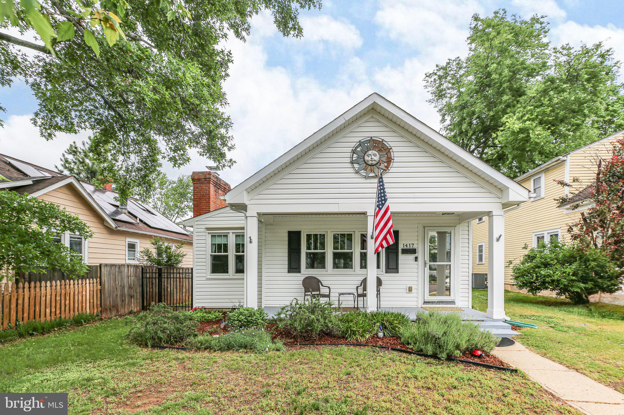 Welcome to this Fabulous ranch home in College Terrace that underwent a complete renovation in 2014 that includes a 6 foot addition on the back to create a large open kitchen/dining area and a nice sized laundry/utility/pantry area as well. One level living at its best! The living room is complete with an inviting brick hearth wood burning fireplace with a unique wood storage area. Hardwood floors in the living room and both bedrooms. The kitchen boasts soft close cabinets, a large island, gas range cooking and lots of storage. The fully fenced back yard includes a big deck and a custom built 2 section shed. A 10' city alley runs behind the house and the power lines were buried during the 2014 renovation.
The front yard has a nice sitting porch and is partially fenced. Off street/driveway parking for one car.