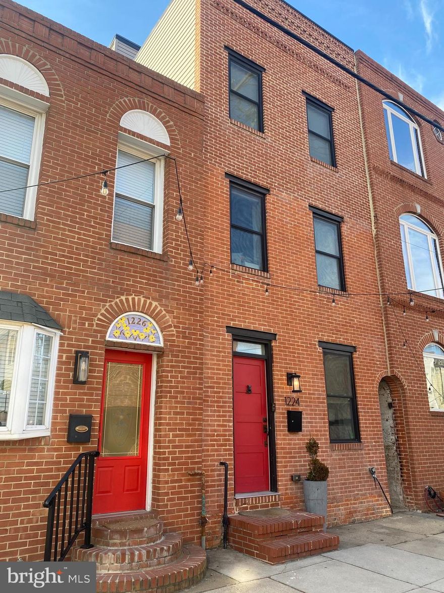 OFFER DEADLINE 2/11 @ 5 PM - EXPANSIVE 3 STORY HOME IN PREMIERE CANTON LOCATION WITH 2 CAR OFF STREET PARKING & REMARKABLE VIEWS FROM ROOF TOP TERRACE - this stylish 5-year young renovation offers buyers an abundance of space with hardwood floors throughout, large living room with tray ceiling, mid-kitchen with 4 stool seating, new quartz countertops, ss appliances, tile backsplash, under cabinet lighting, crown molding, custom cabinetry with pantry, convenient main level half bath and large rear dining room leading to oversized 2 car parking pad.  Upper levels offer 4 spacious bedrooms, 4 bathrooms, custom metal railings, hallway laundry room and luxurious owner suite with private rear balcony, soaking tub/shower combination, designer tile and double bowl vanity.  Hallway access leads to roof top terrace with unobstructed panoramic views of the city skyline and harbor water views - this one is a must see!