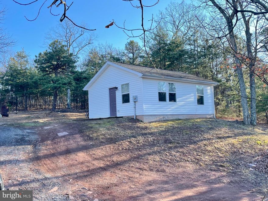 Welcome home!  This adorable, well kept one level home is all you need!  This well laid out 2 bedroom, 1 bathroom home is at the end of the road with great views and privacy.  The home offers a newer mini split unit and was built in 2009.  This home would make a great getaway cabin, starter home, or good for downsizing!  Sitting on 1.15 private wooded acres, you will be near hunting, fishing and floating on Back Creek and Sleepy Creek Wildlife areas.  Septic was inspected and pumped in 2021.