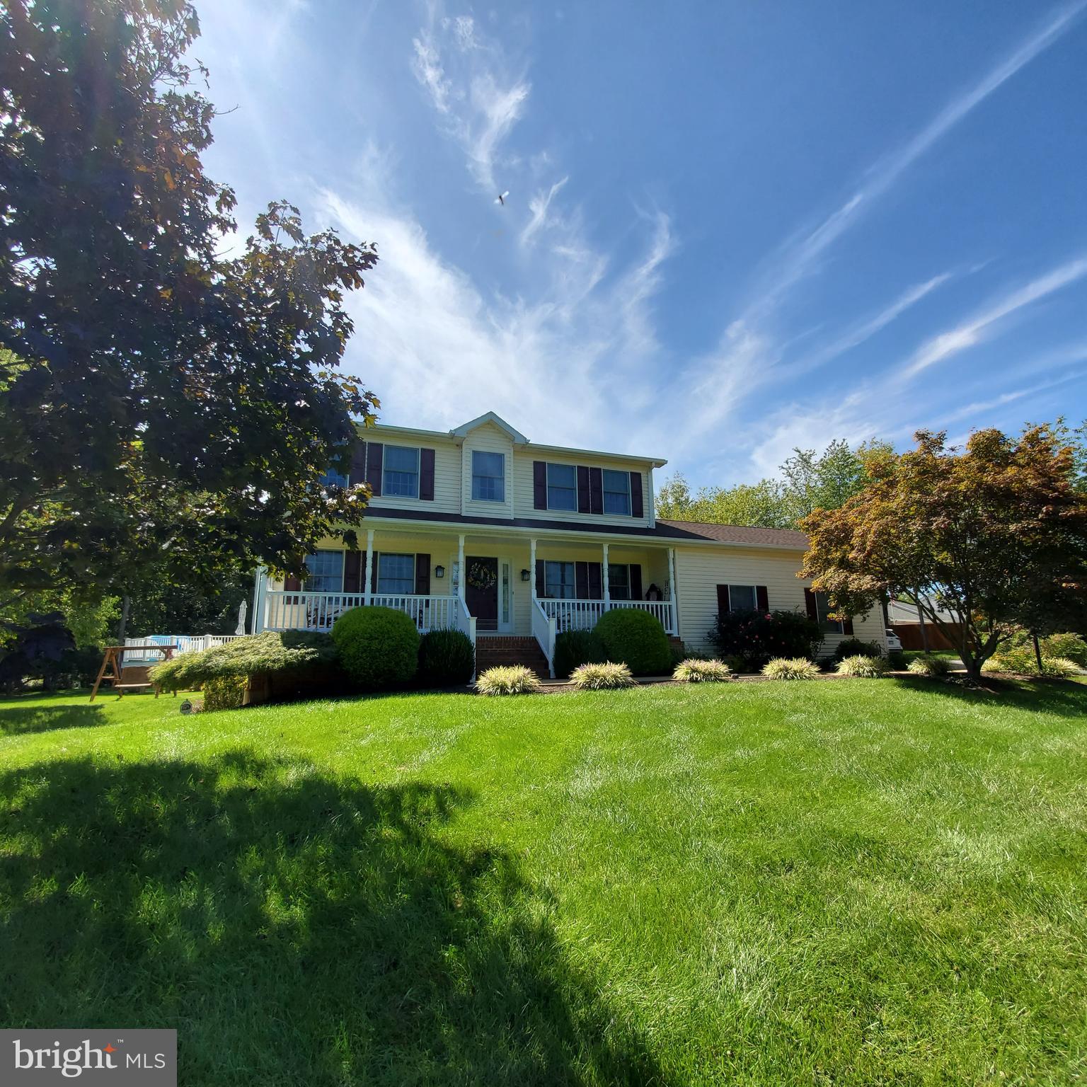 REWARD YOURSELF !!! What's not to like - This Impressive Colonial just feels like Home & is Move -In Ready . Features Covered Front Porch for your enjoyment, 4 Bedrooms , 2 Full Baths & 2 1/2 Baths, Main level Laundry / Mud Room, Large Eat-in Kitchen w Stainless Steel Appliances, Island, Granite Countertops, as well as Formal Dining Room, Hardwood Floors t/o the home on both levels & Roof only 4 yrs old. This property has been wonderfully landscaped front & rear yards -Fenced area in rear yard with above ground pool, 12 x 14 Covered Porch w fan & additional maintenace -free deck for your enjoyment, sun bathing - entertaining or just spending time with the family. Side-Load 2 Car garage as well as 12 x 24 Storage Shed . Finished Basement with 4th Bedroom, Family room, additonal room for playing cards, office & storage room. A "MUST SEE" to appreciate this Park Like Setting consisting of a 2 acre corner lot in small well-established subdivision / neighborhood - located approx 10 minutes from Historic Shepherdstown & Martinsburg with easy access to Shopping, Hospitals & Marc Train. EASY TO SHOW - We look forward to you touring this Well - Maintained Home!!! LOCATION LOCATION LOCATION !