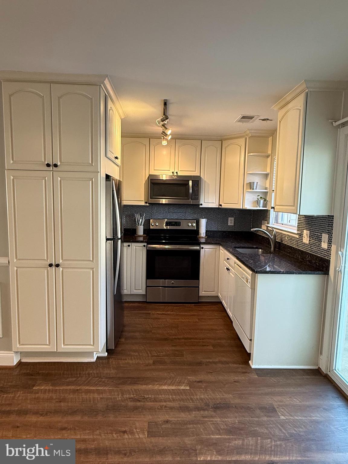 8702 VILLAGE GREEN COURT